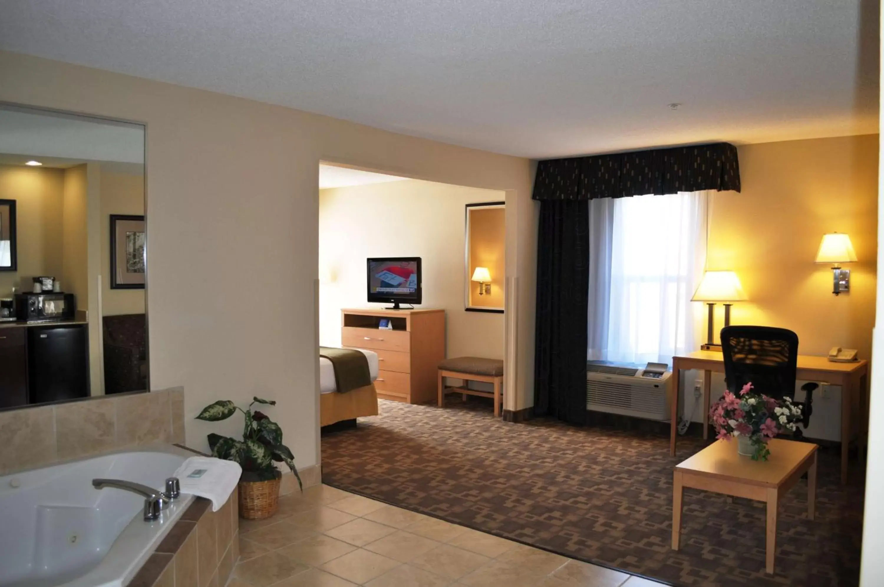 King Suite with Spa Bath in SureStay Plus Hotel by Best Western Roanoke Rapids I-95 King Suite with Spa Bath in SureStay Plus Hotel by Best Western Roanoke Rapids I-95