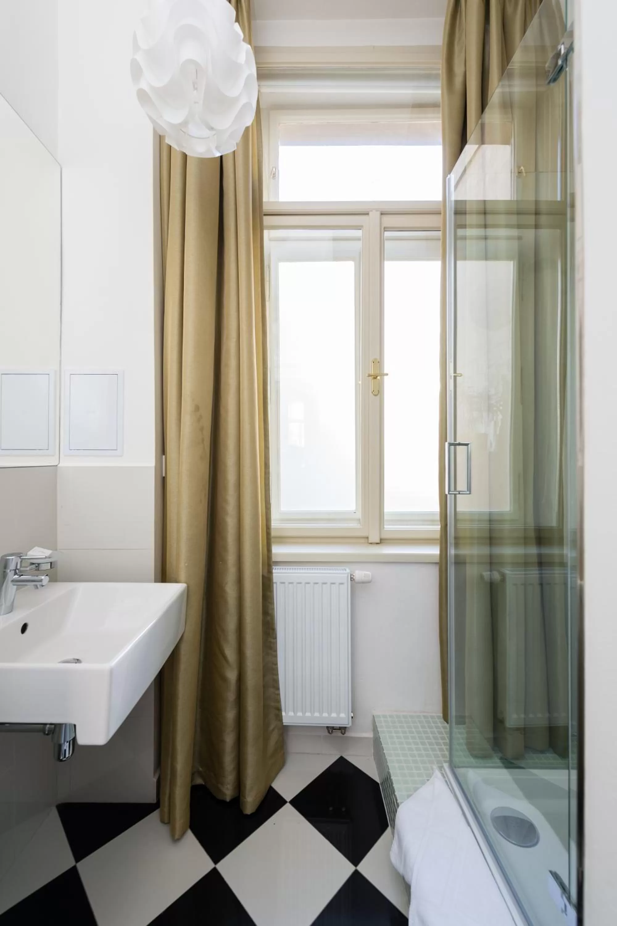 Bathroom in Grand Central Residence by TKC