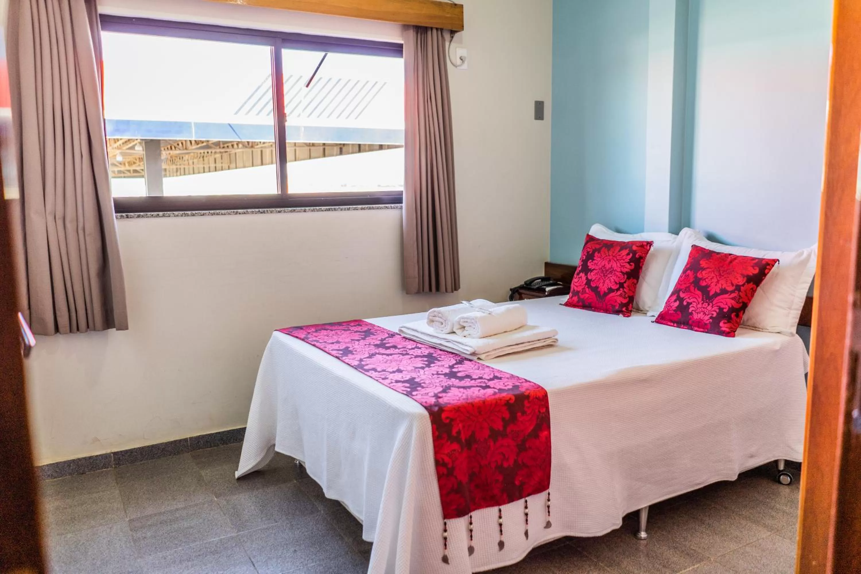 Bed in Pousada Paraiso