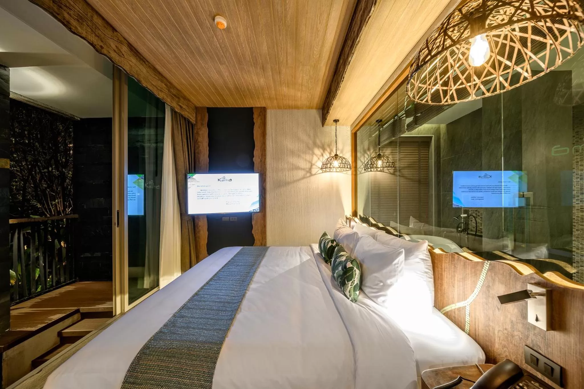 Bed in Kalima Resort and Villas Khao Lak