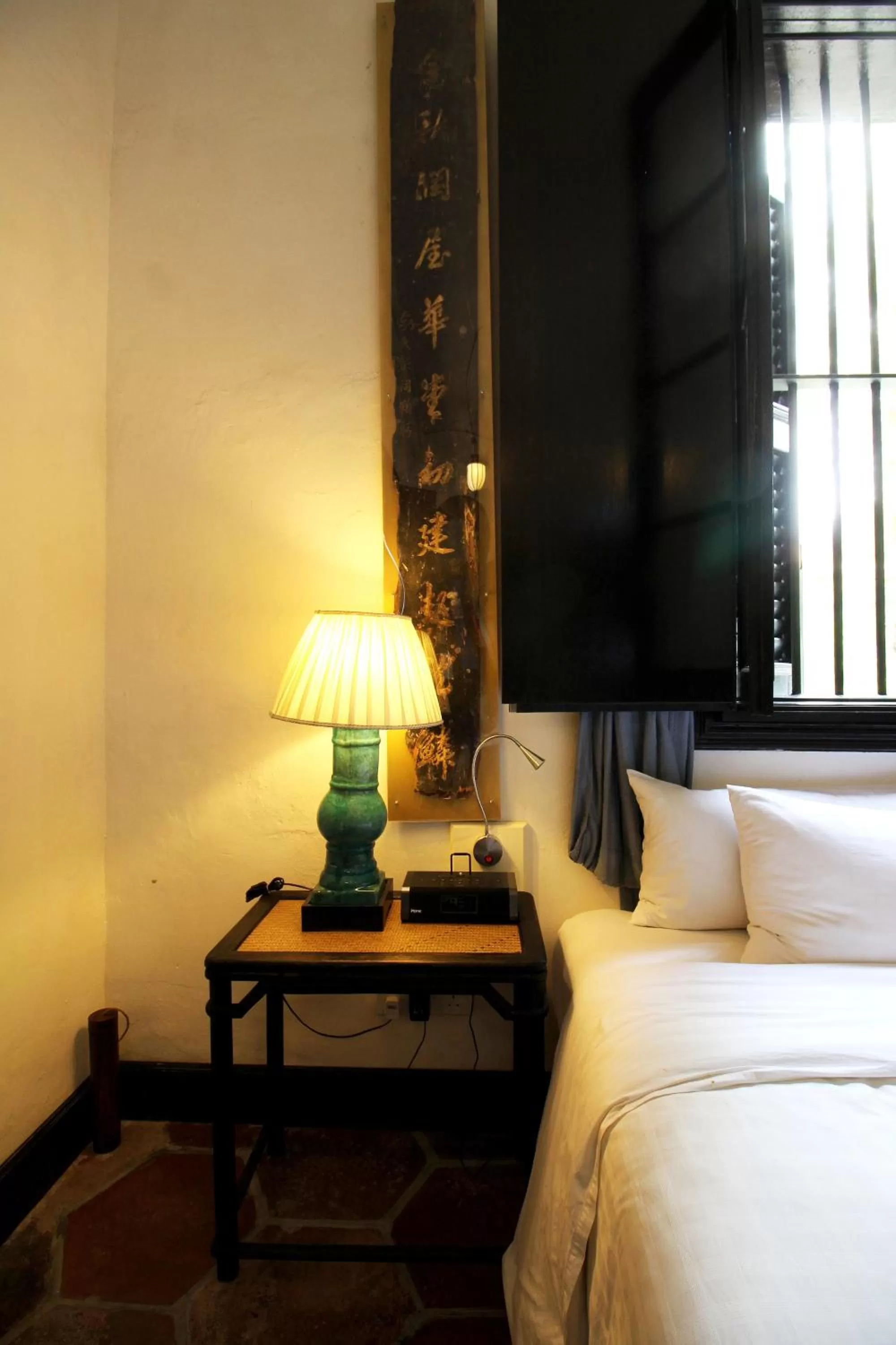 Decorative detail, Bed in Cheong Fatt Tze - The Blue Mansion