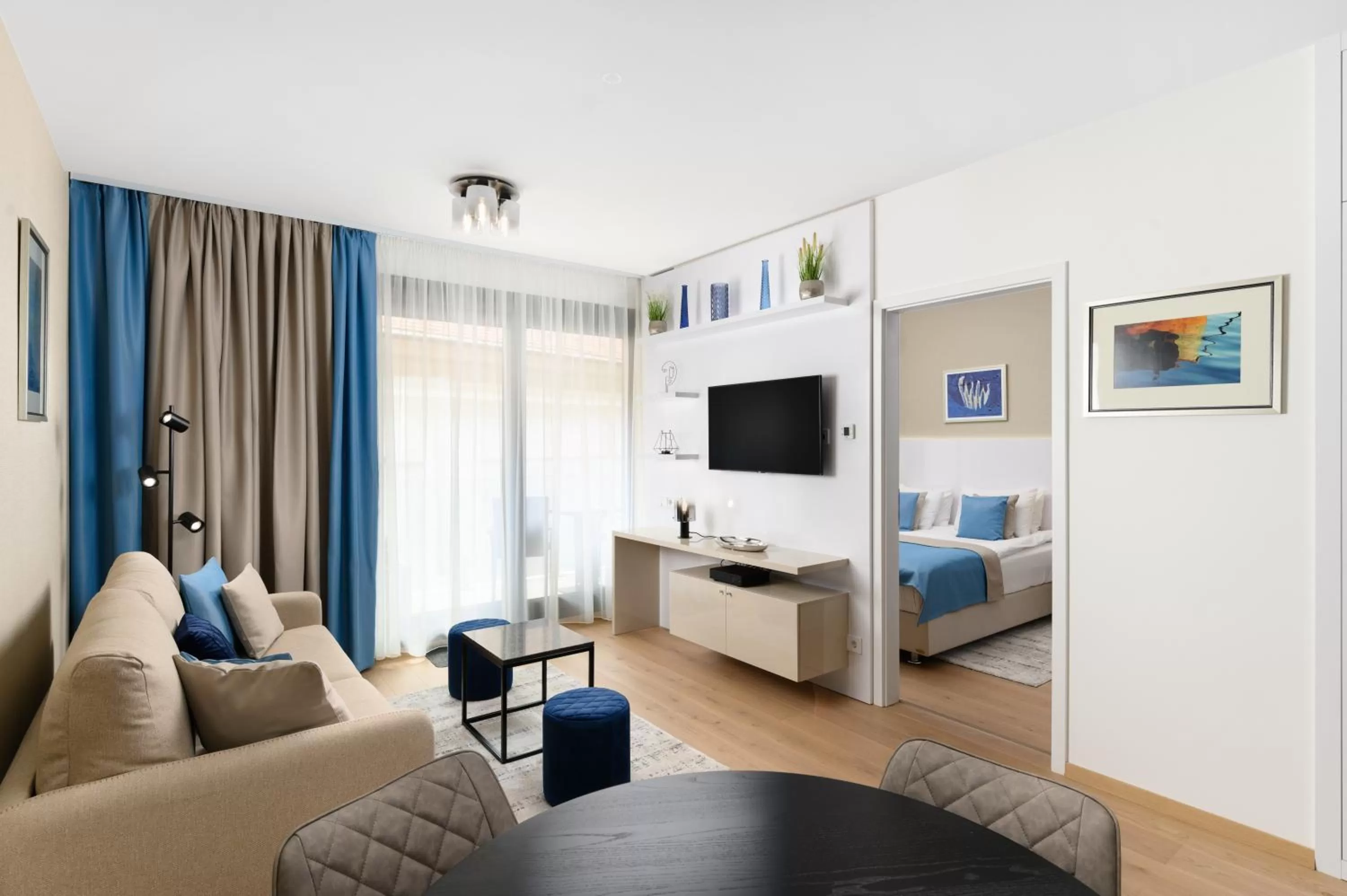 Living room in Emerald Downtown Luxury Suites by Continental Group