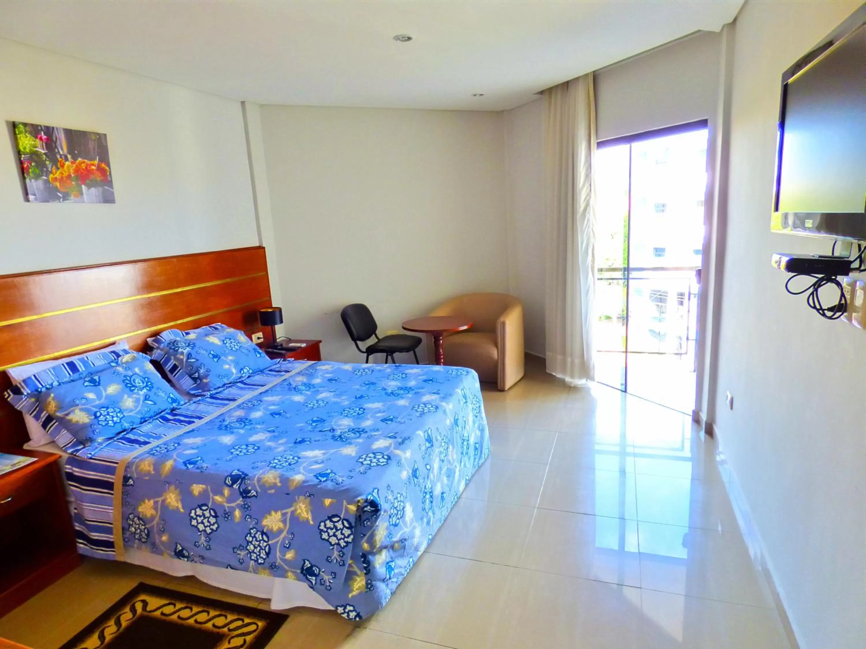 Photo of the whole room, Bed in De La Costa Hotel