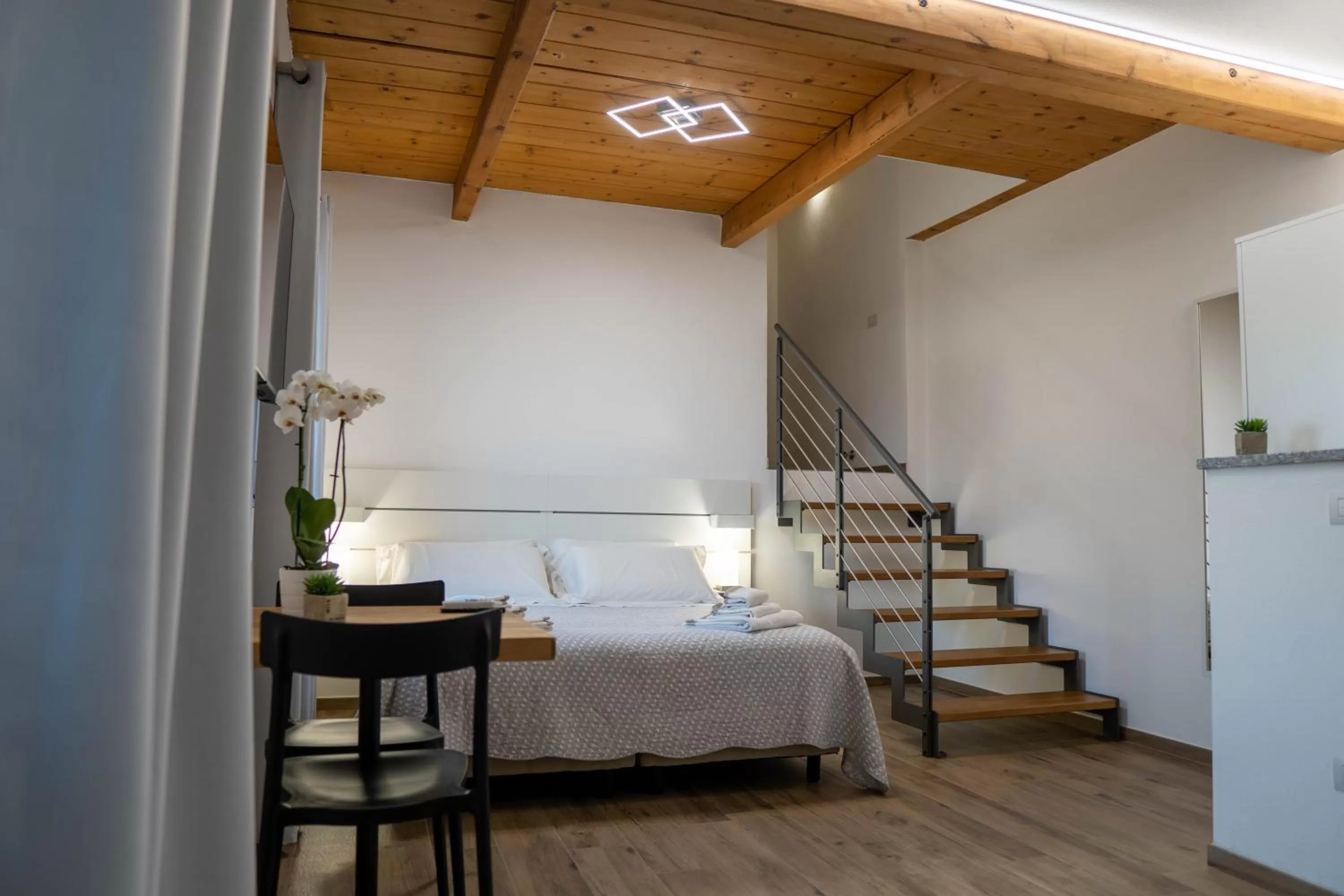 Photo of the whole room, Bed in Residence Le Palme