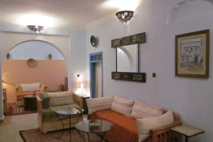 Communal lounge/ TV room, Seating Area in Hôtel Ras El Maa