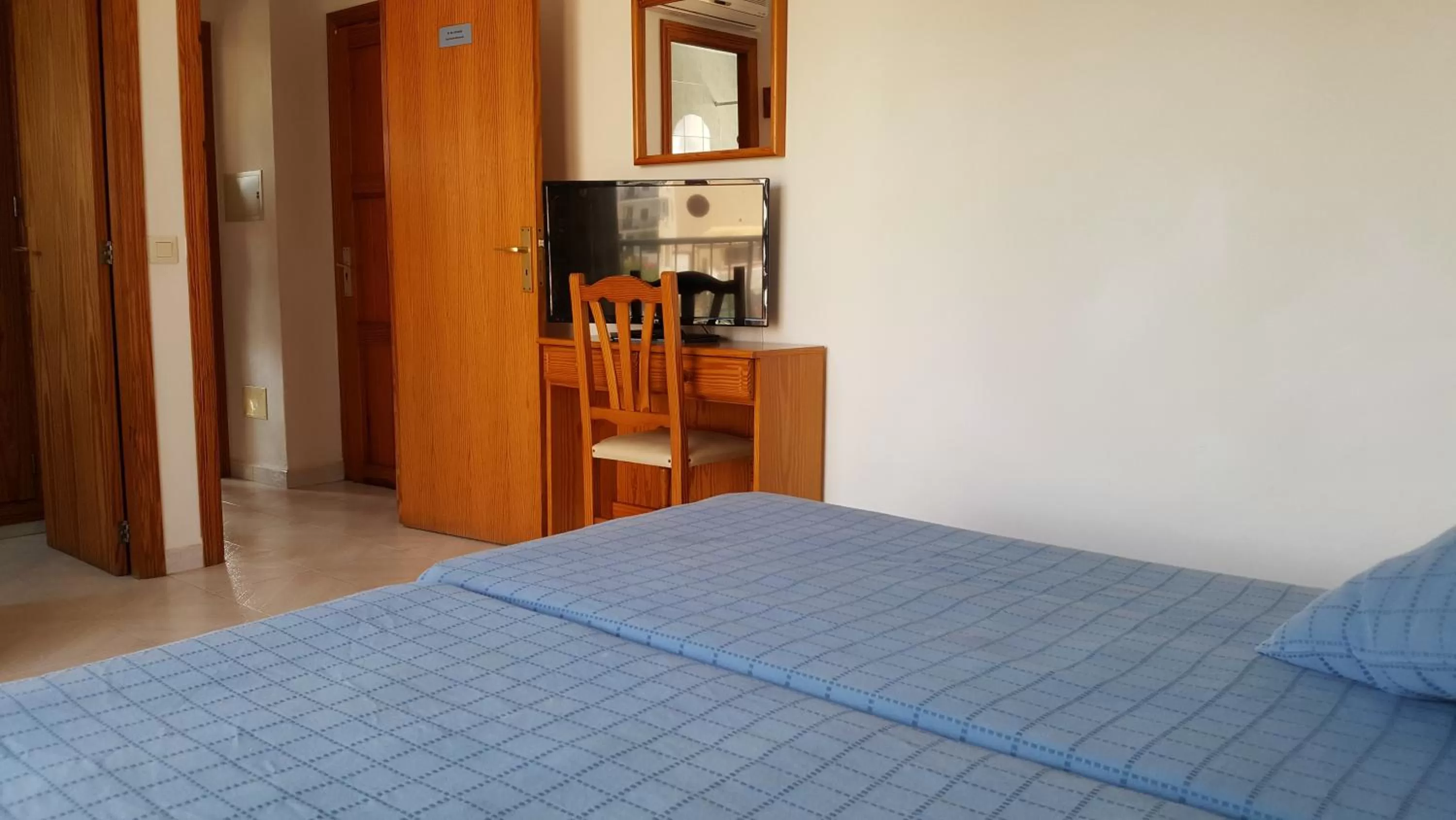 Bed in Bella Maria Apartments