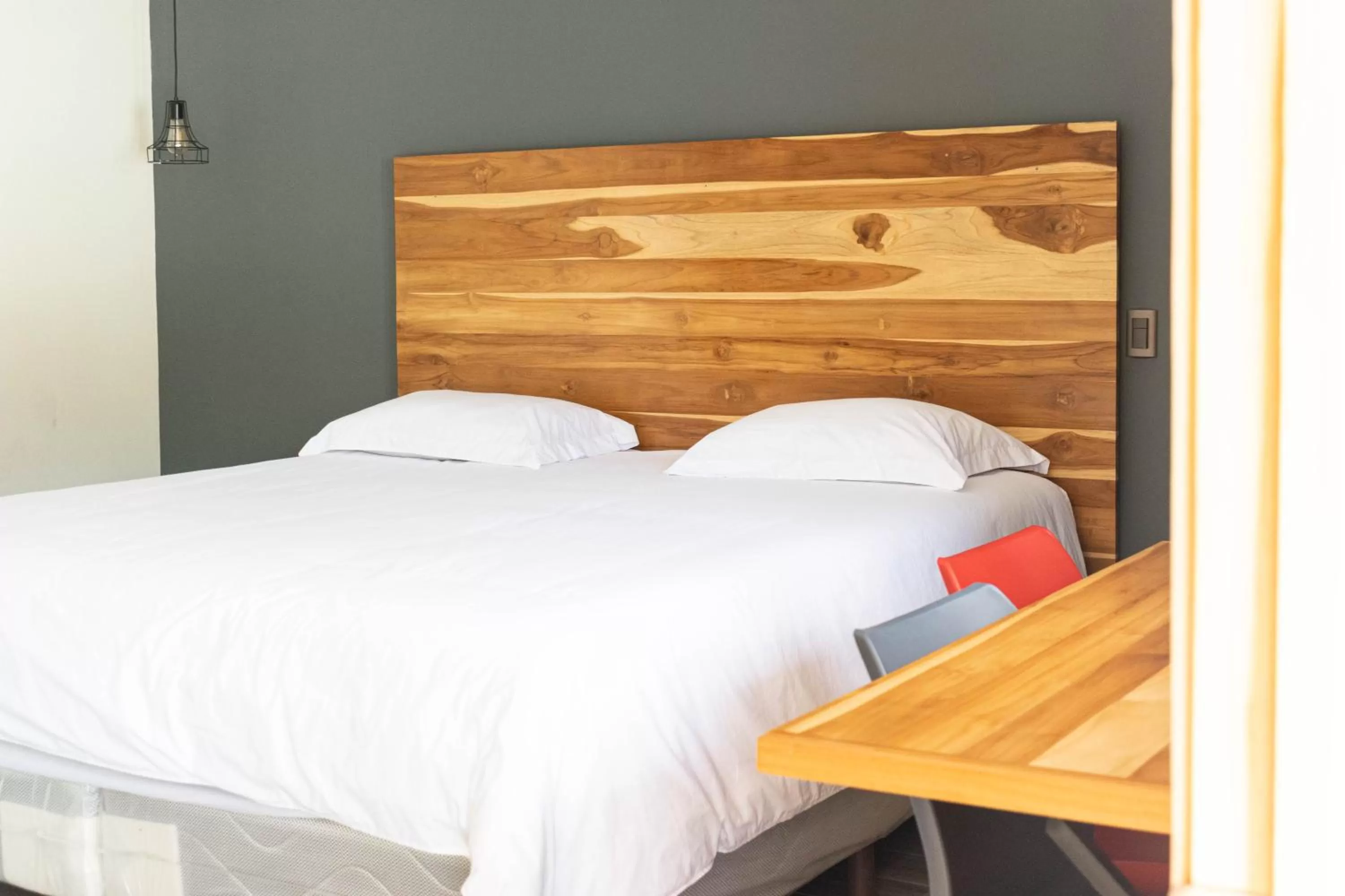 Bed in Casa Montana Hotel