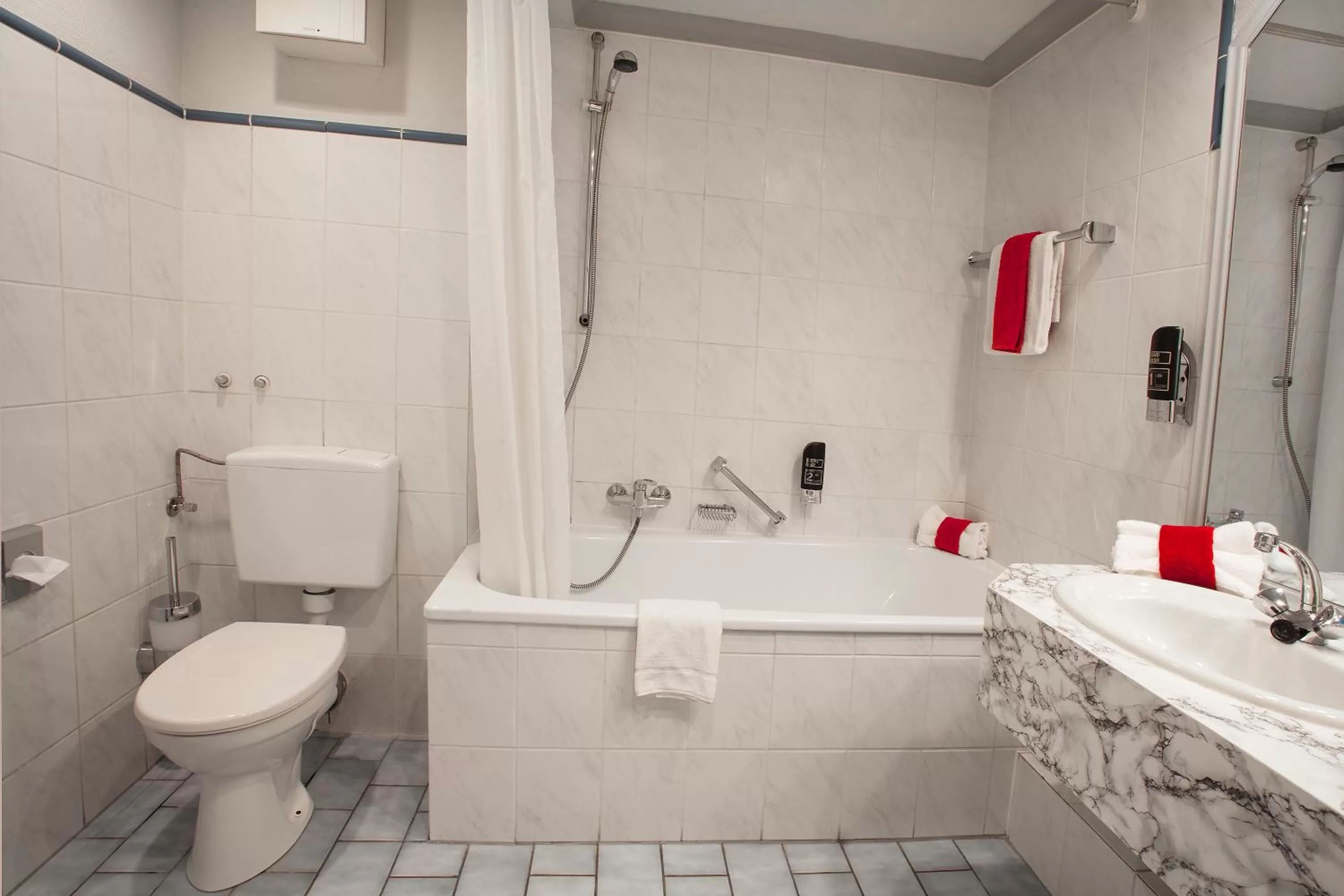 Bathroom in INA Hotel Royal