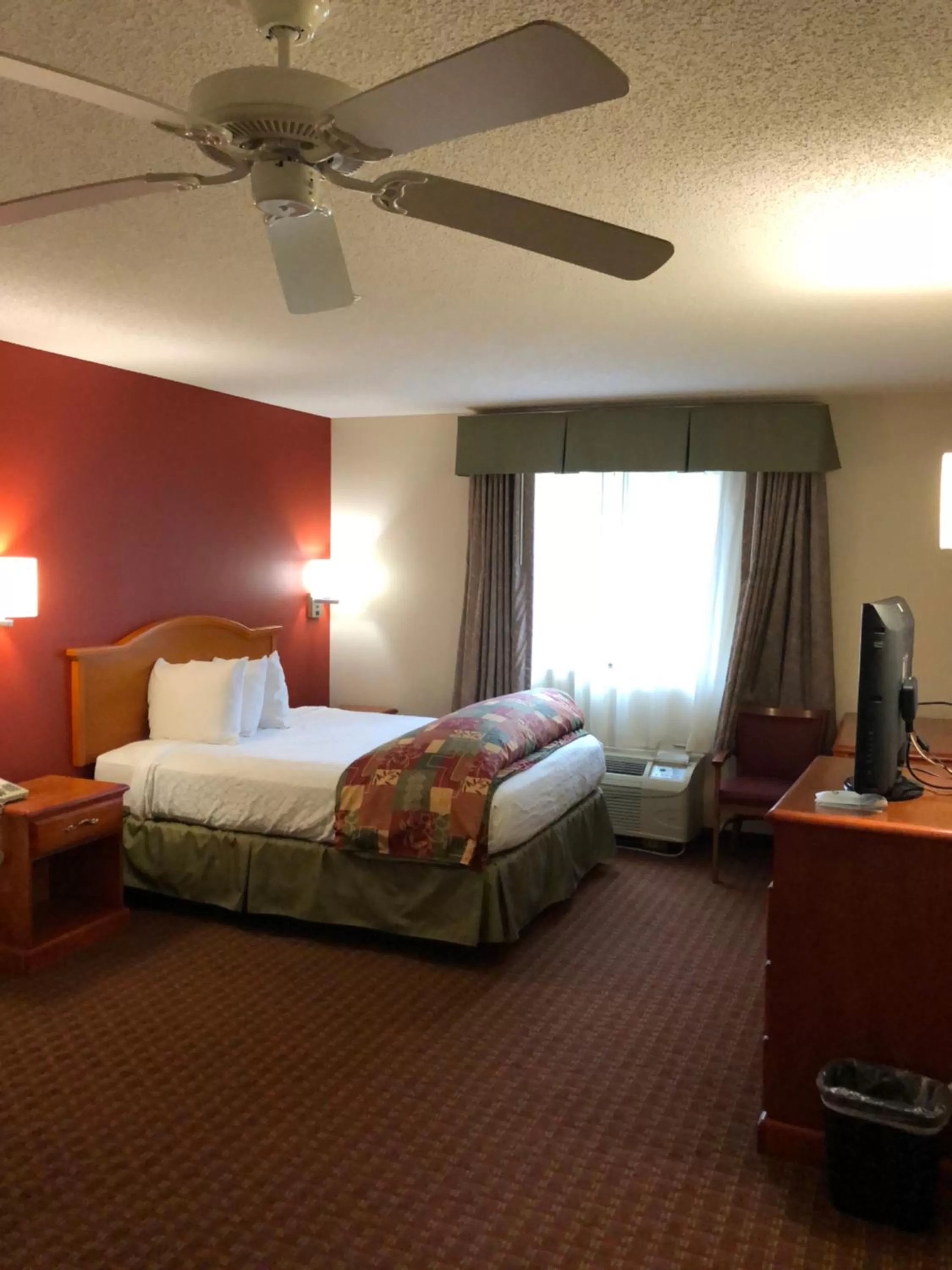 Bed in Millennium Inn