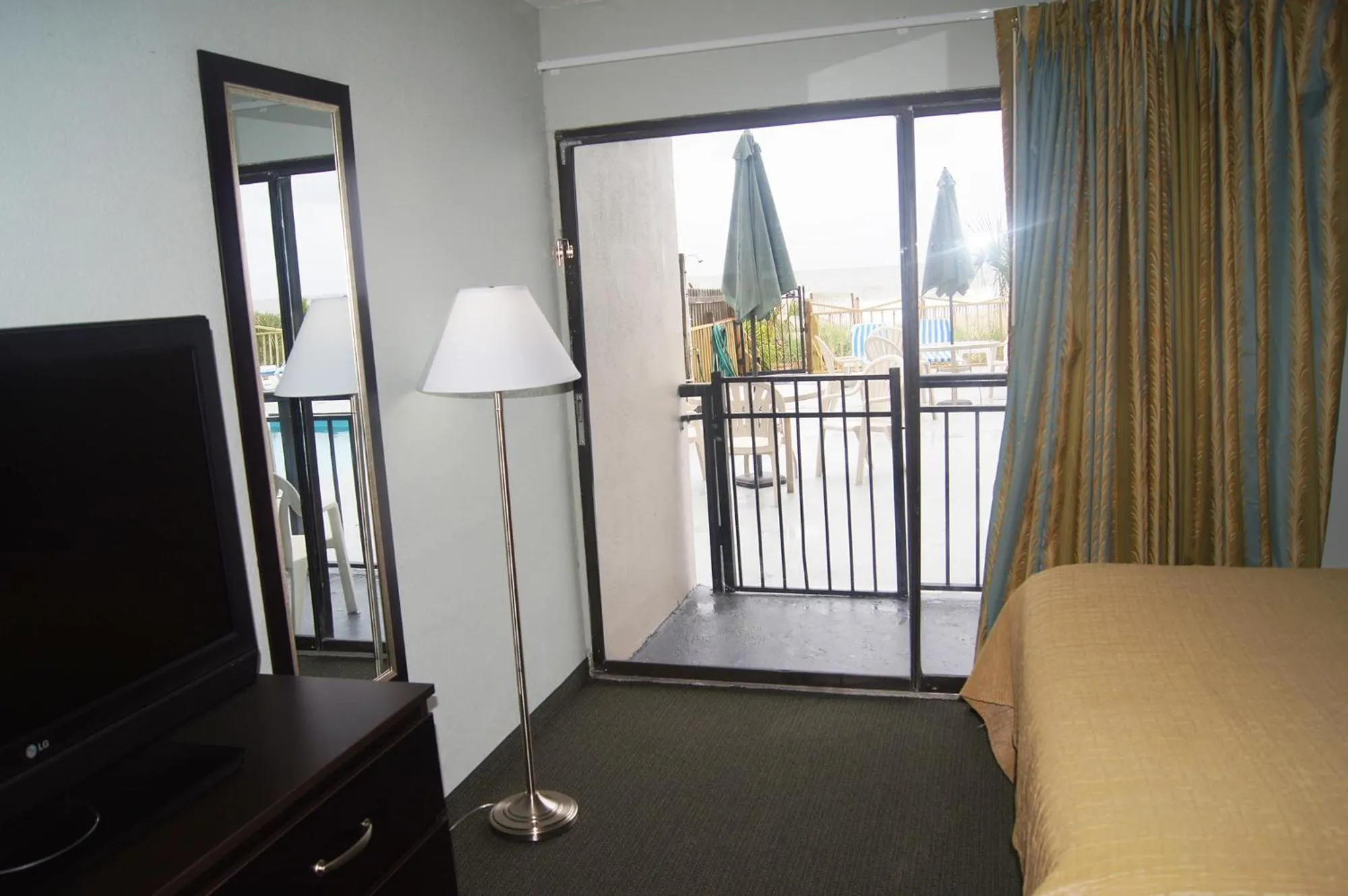 Bed in Ocean Plaza Motel