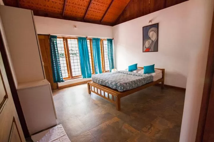 Bed in Marmalade Springs Resort Wayanad