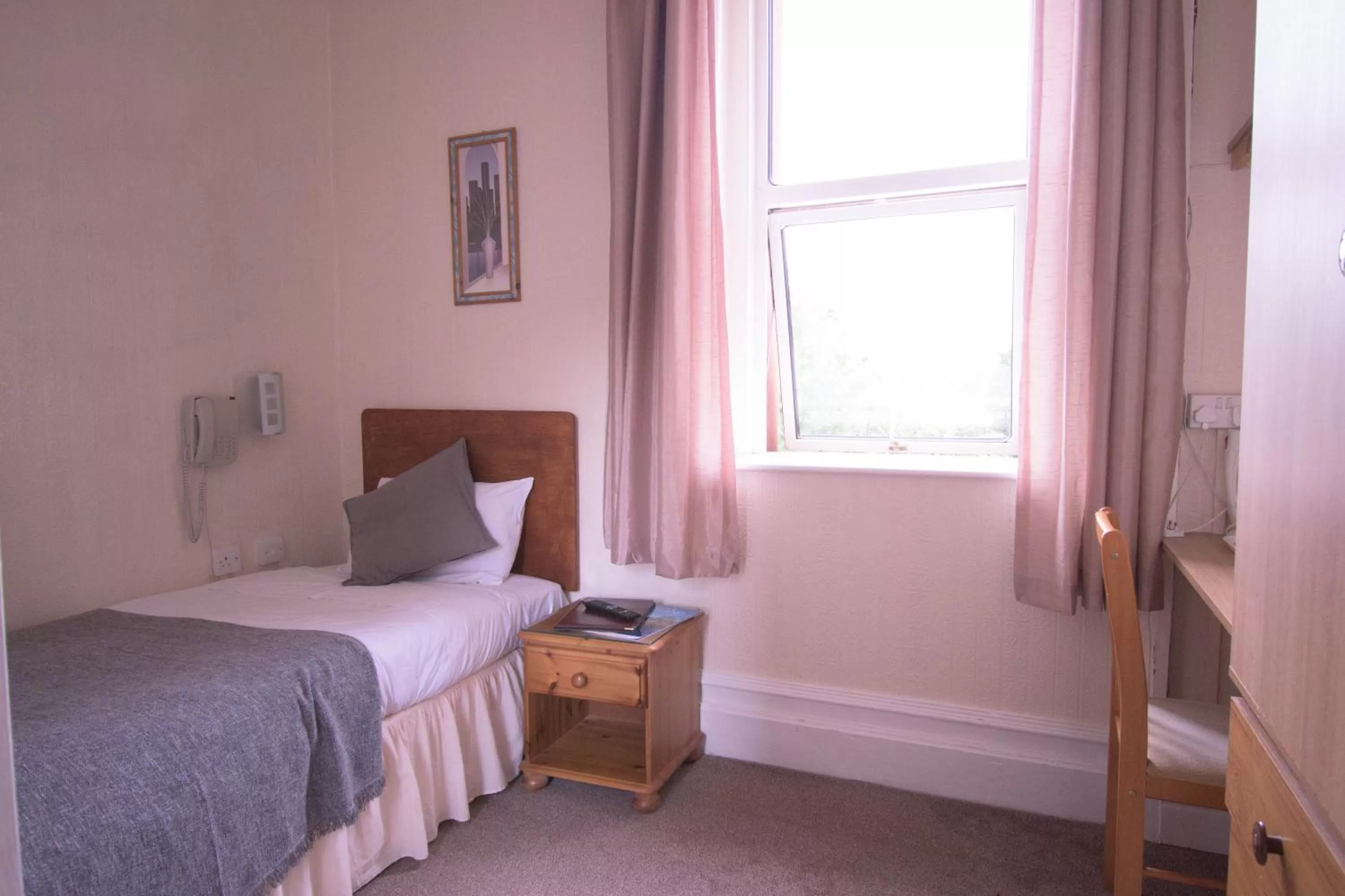 Bed in Pinegrove Hotel