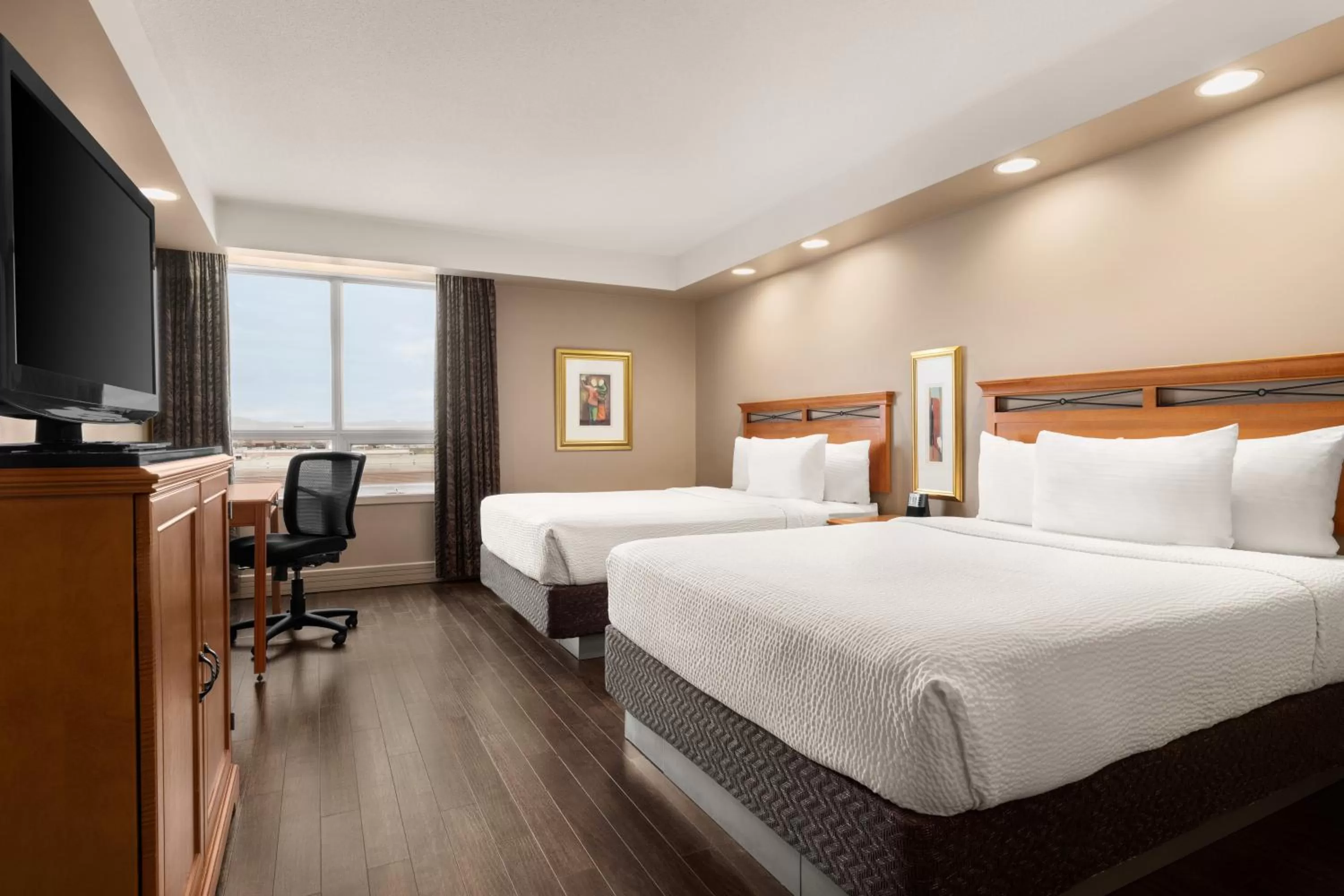 Bed in Royal Hotel Calgary, Trademark Collection by Wyndham