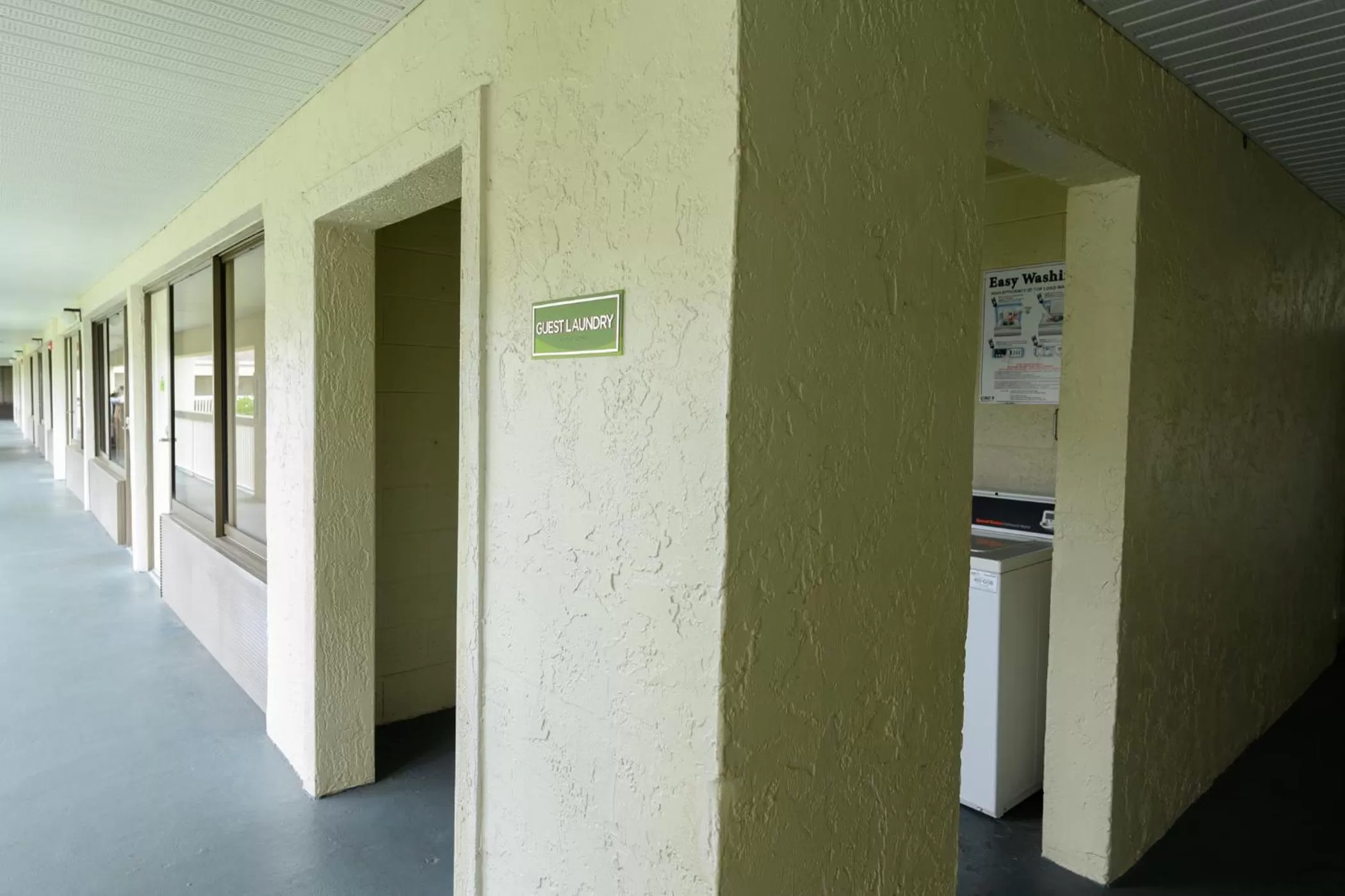 Property logo or sign in Hotel Room Near Disney 4 People