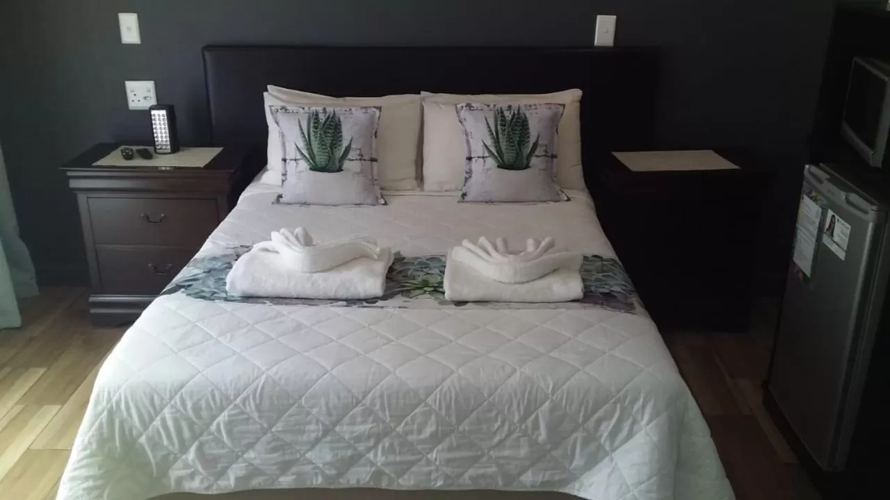 Bed in Vignes Guest Lodge