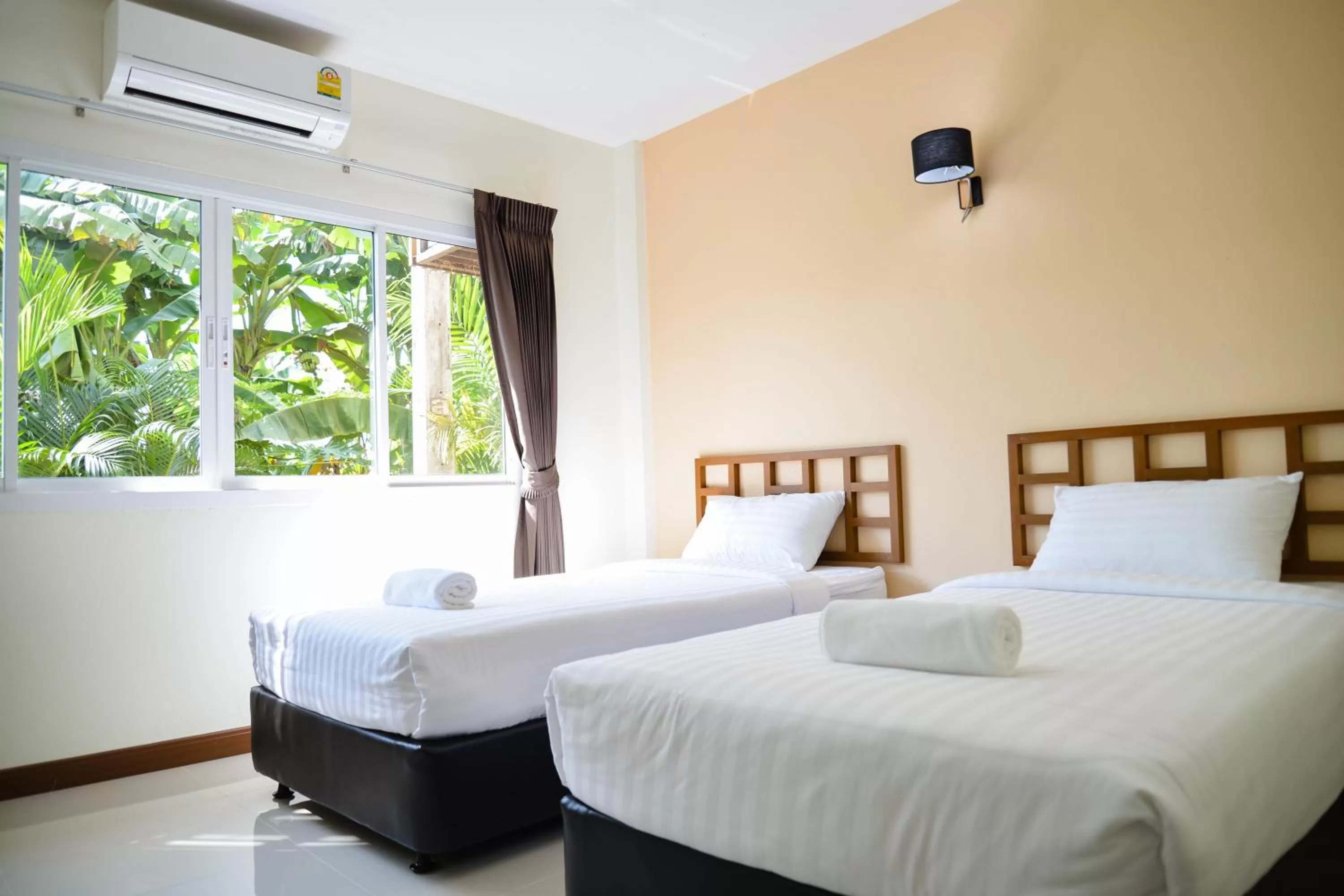 Bed in Thaimit Resort