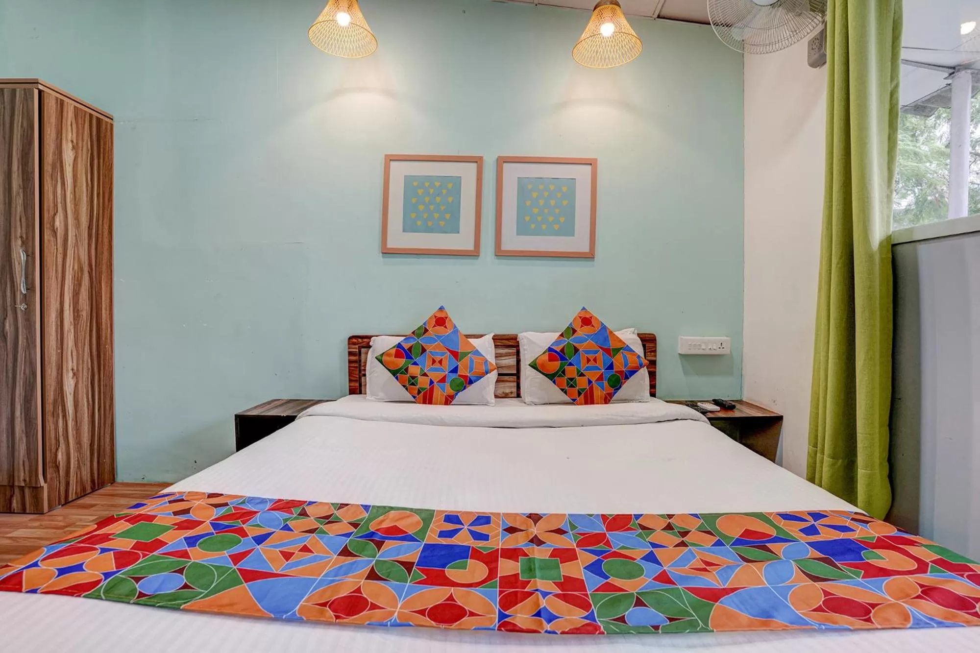 Bed in FabHotel Vardhan House