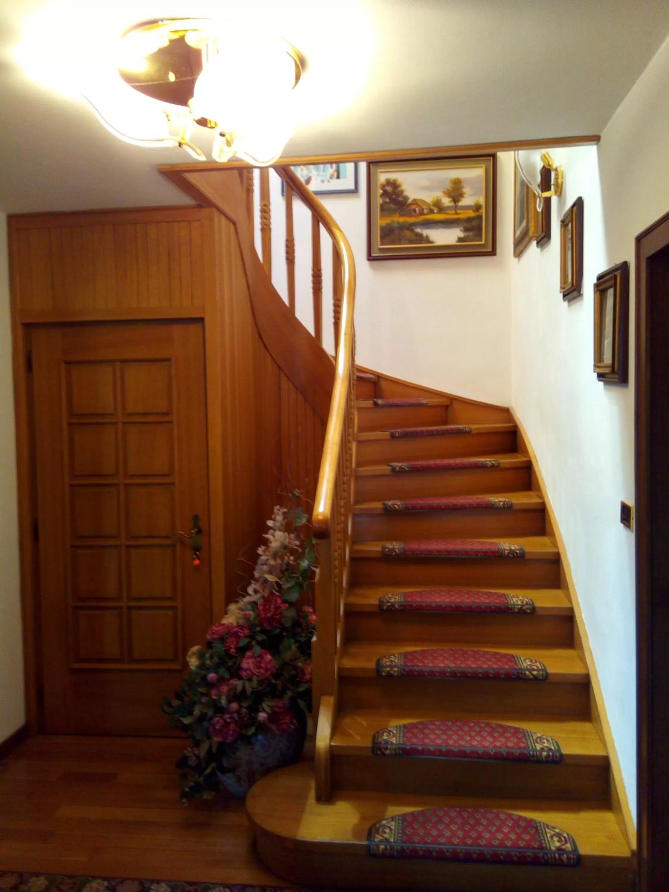 Communal lounge/ TV room in B&B Casa Bazzanella