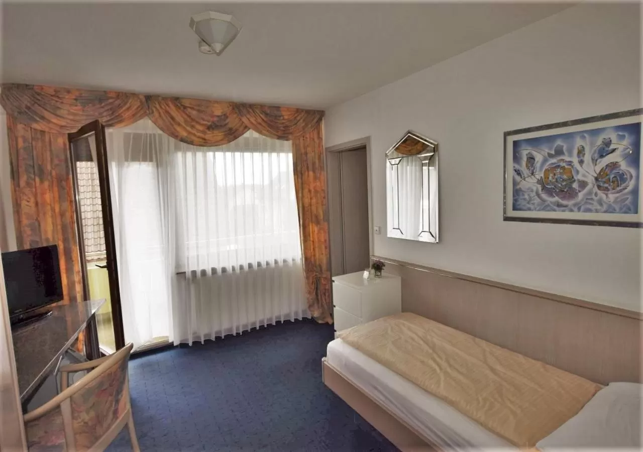 Photo of the whole room, Bed in Hotel Alena - Kontaktlos Check-In