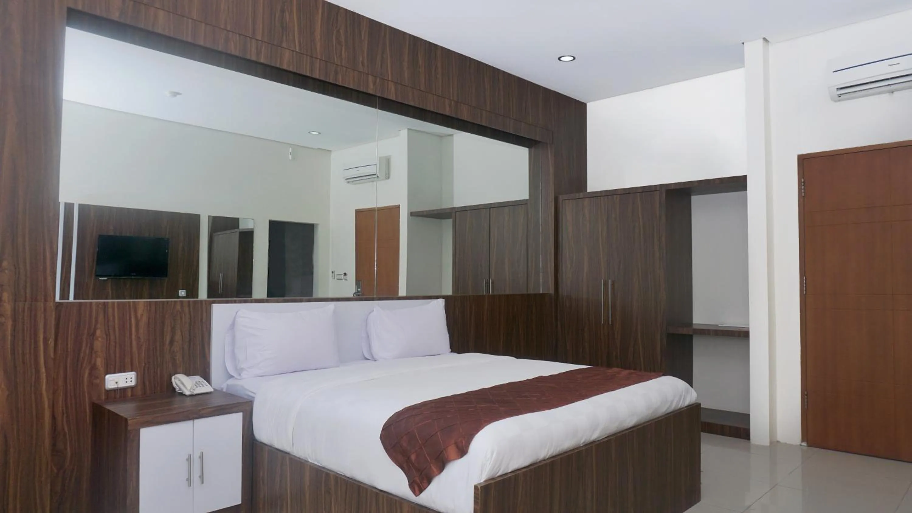Bed in Grand Cordela Hotel AS Putra Kuningan