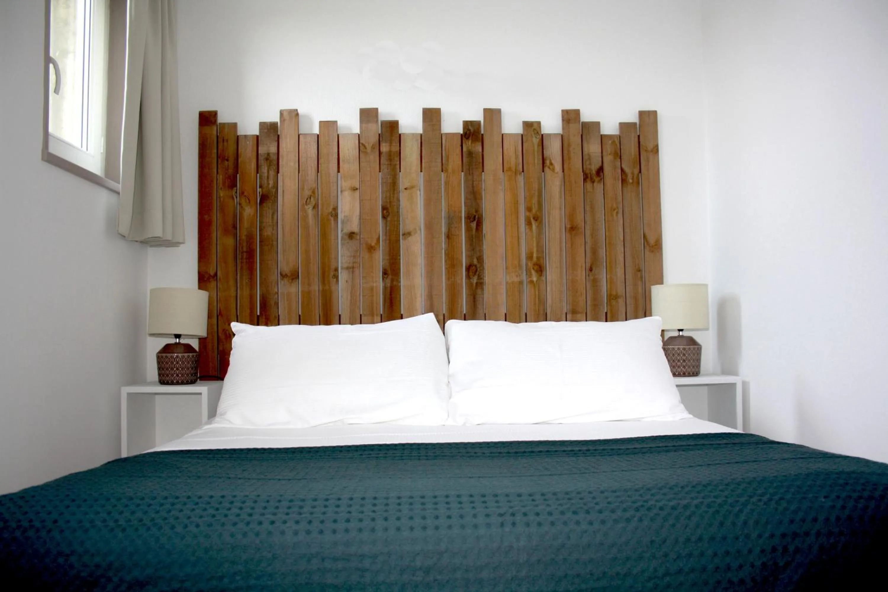 Bed in Logis Hôtel Sea View