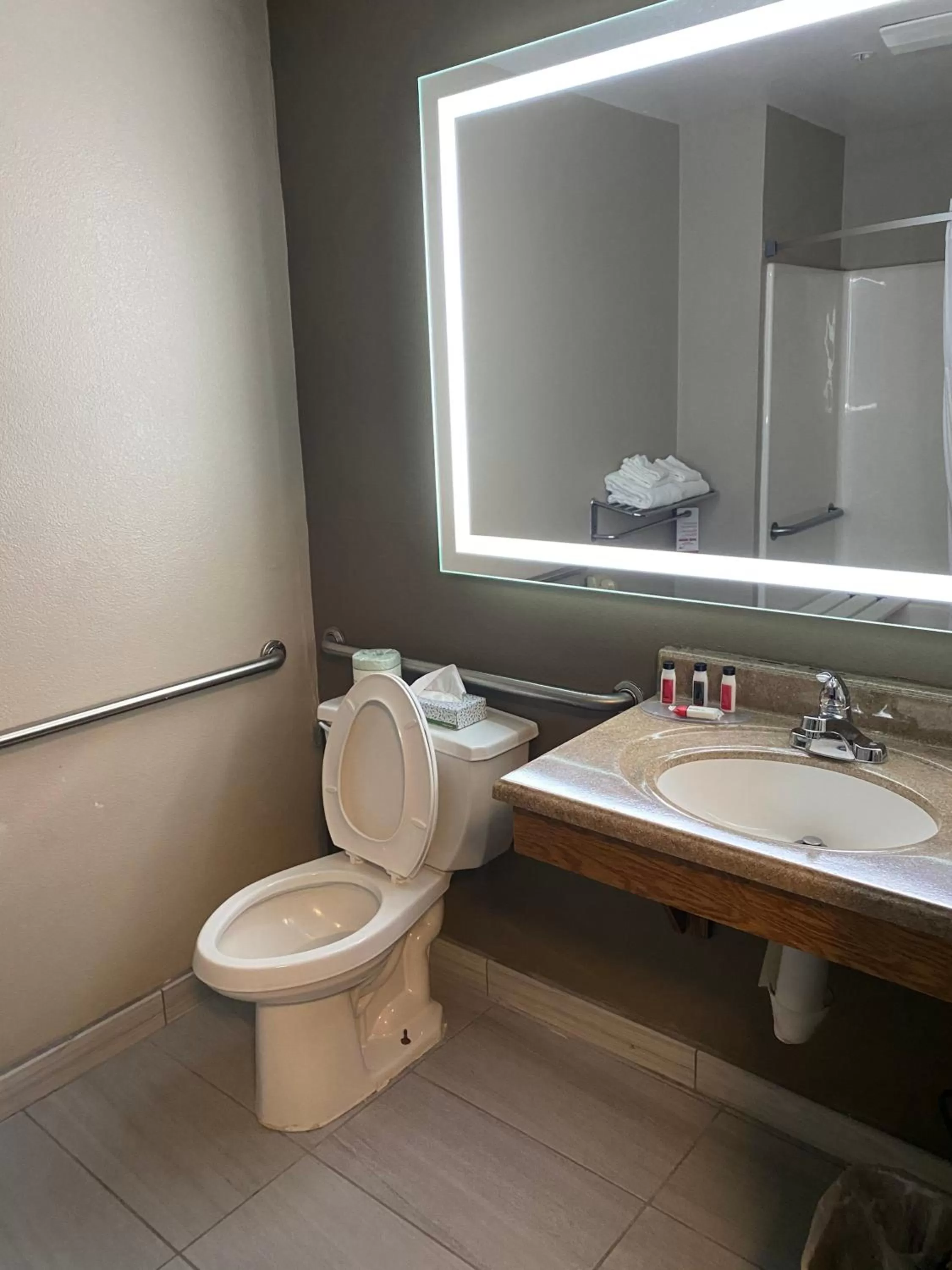 Bathroom in Super 8 by Wyndham Lynchburg VA