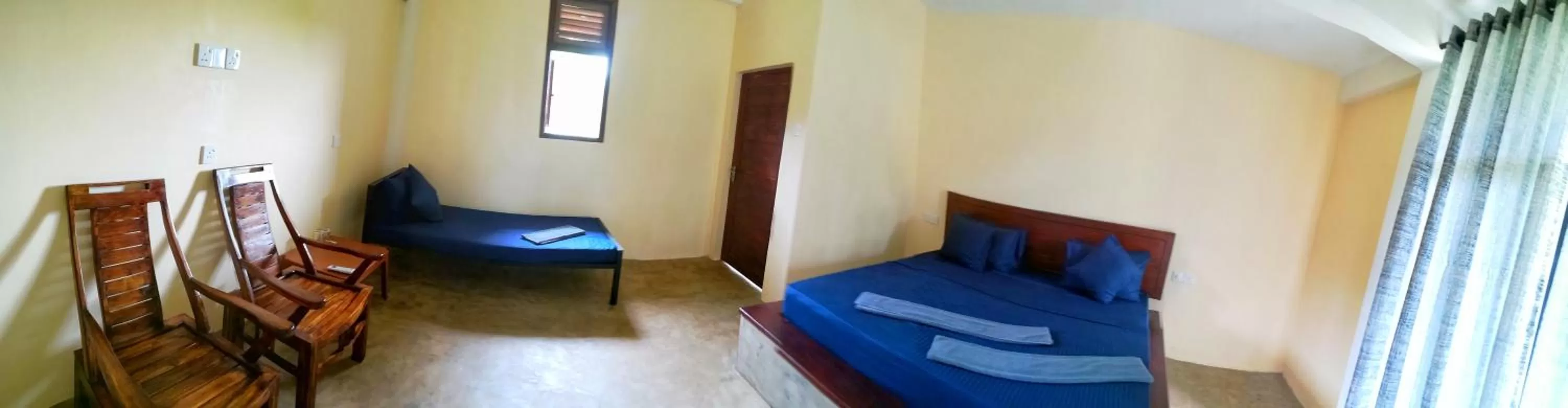 Bed, Seating Area in Lake Bliss