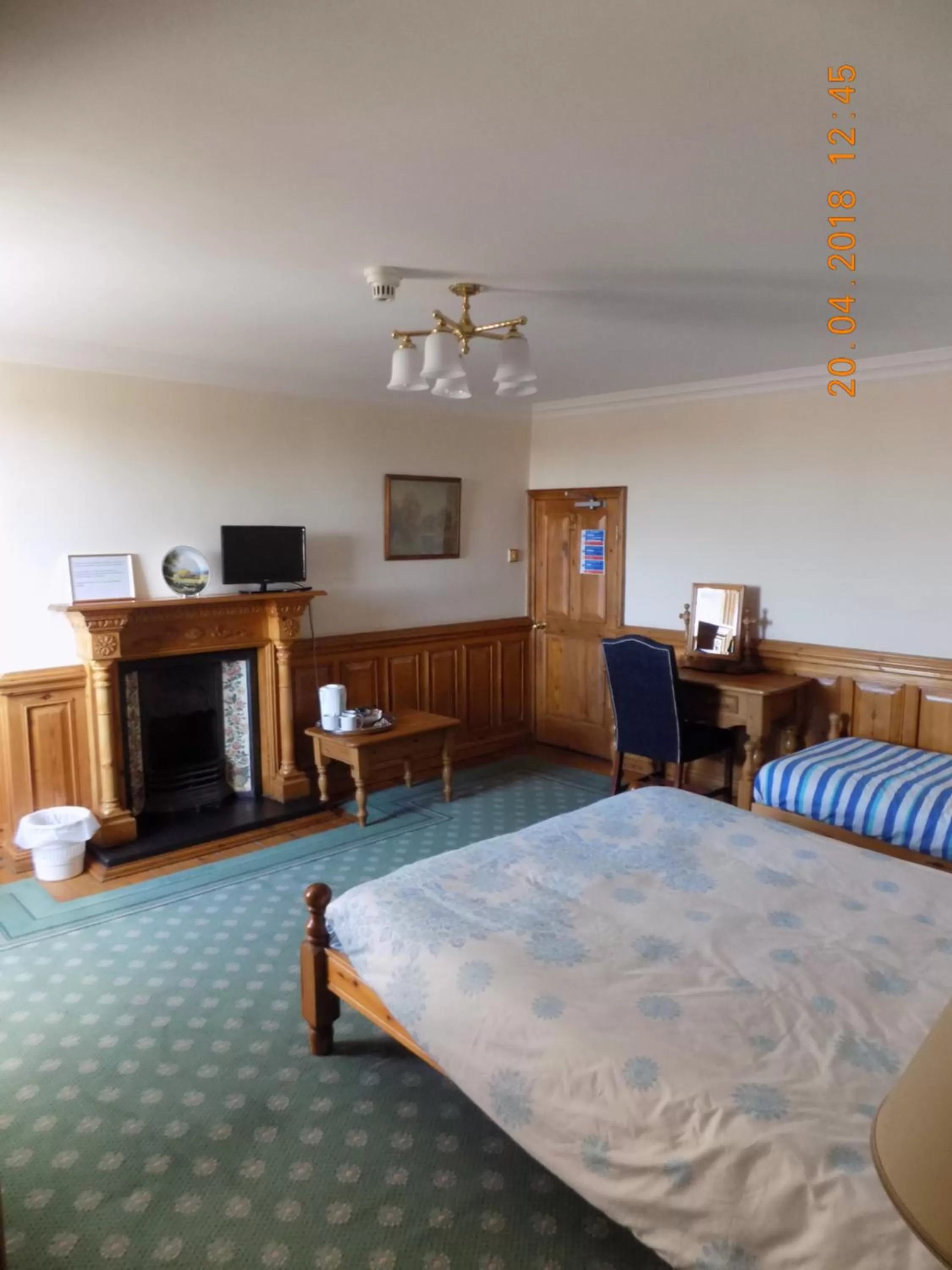 Bed in The Londesborough Arms bar with en-suite rooms