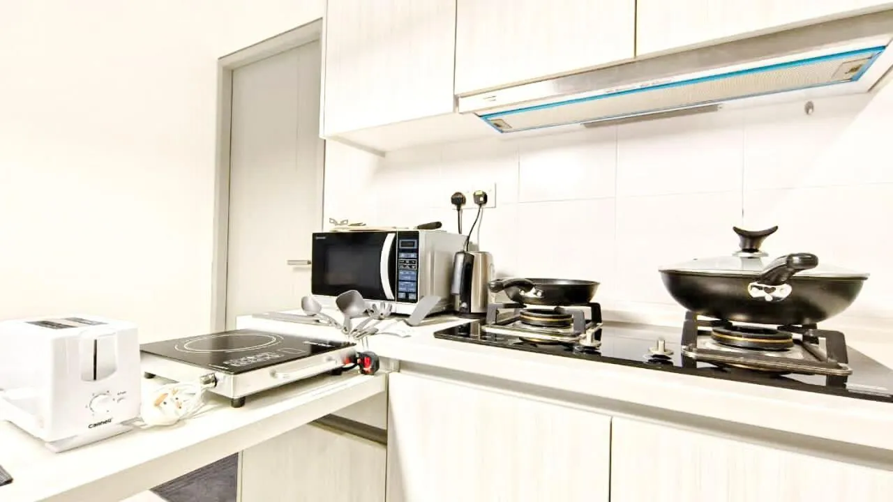 Kitchen/Kitchenette in 1 Tebrau Suites by Subhome