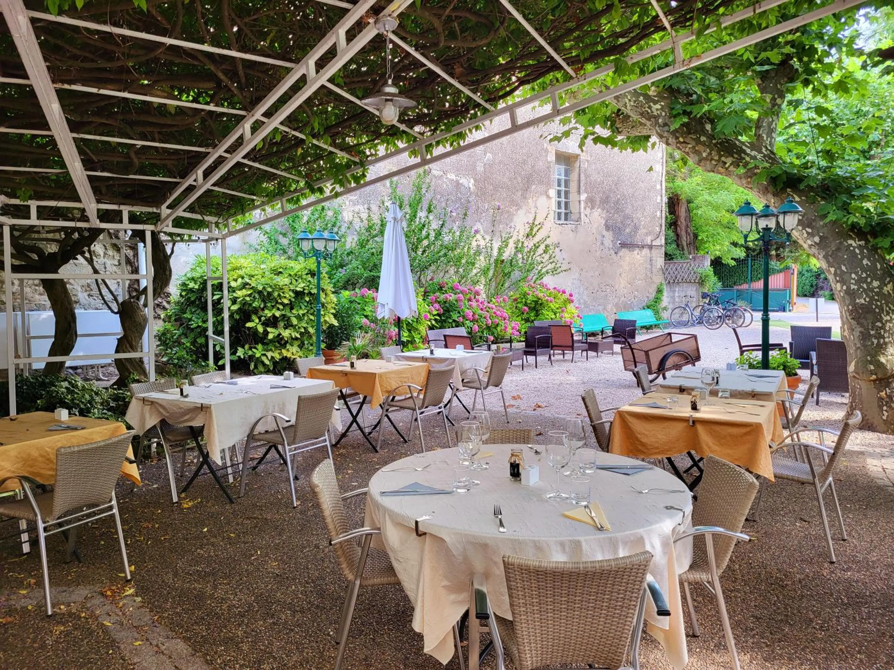 Patio in Logis Hotel la Ferme