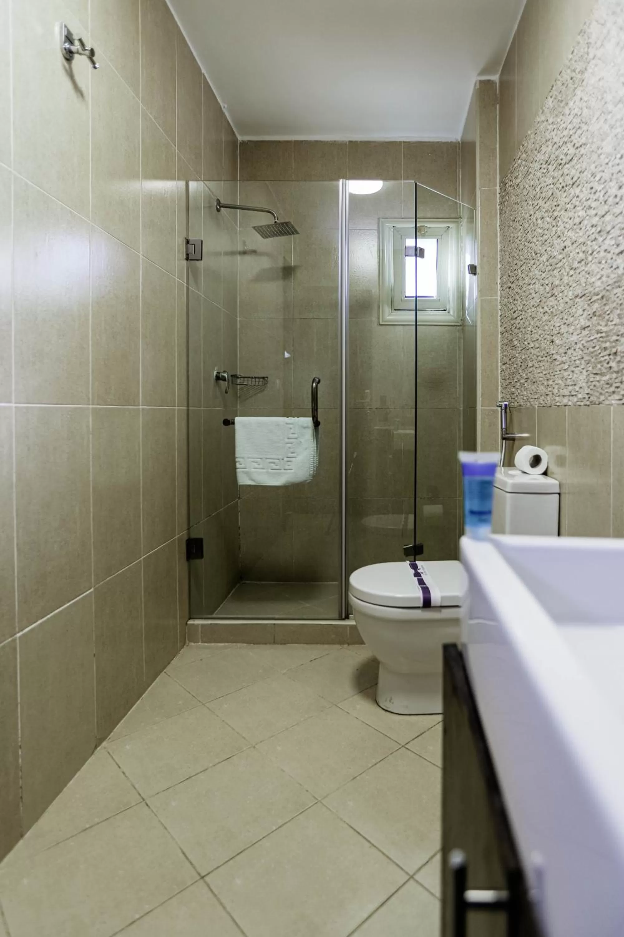 Bathroom in NewCity Hotel & Suites