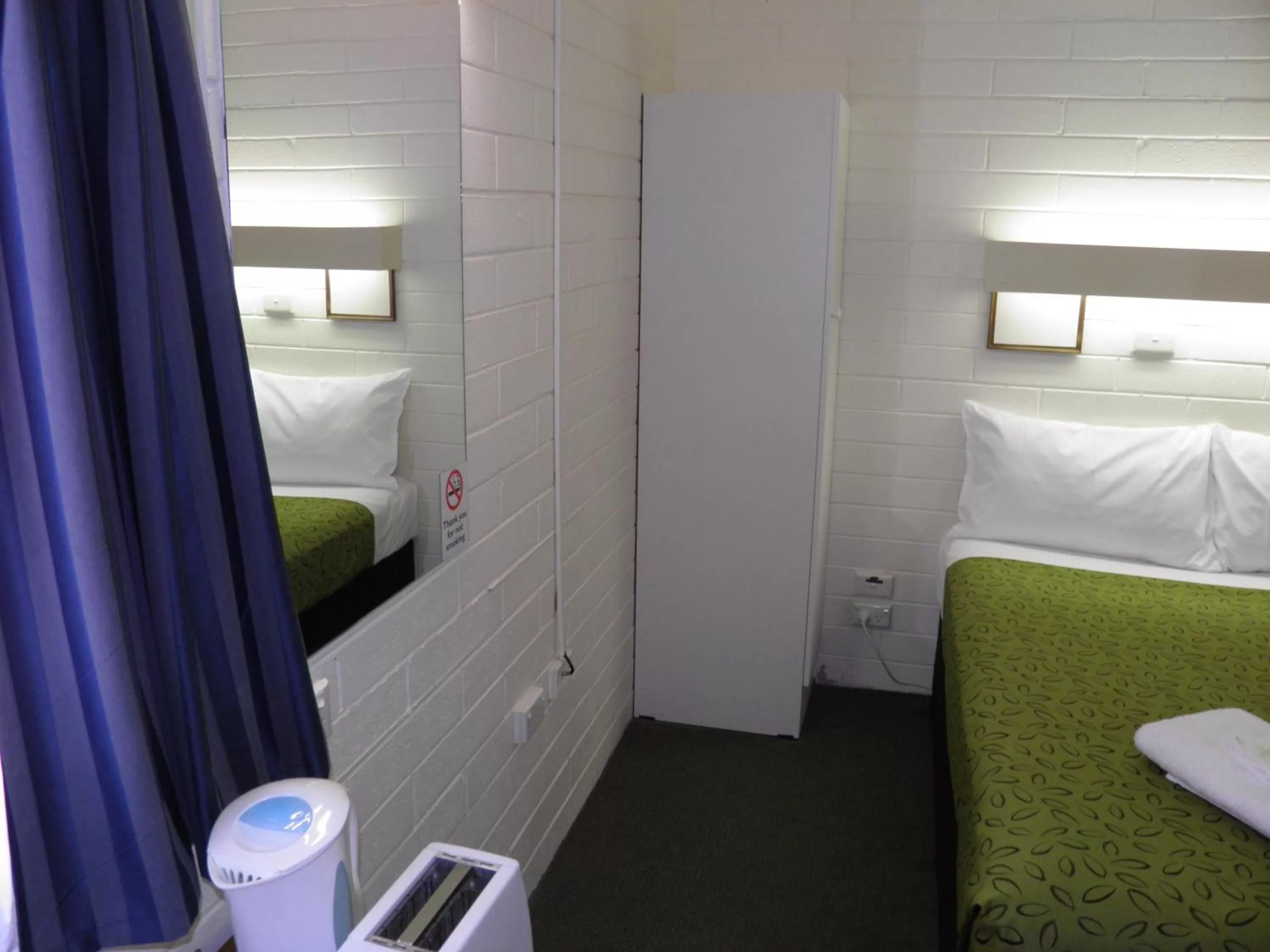 Photo of the whole room, Bathroom in 7th Street Motel