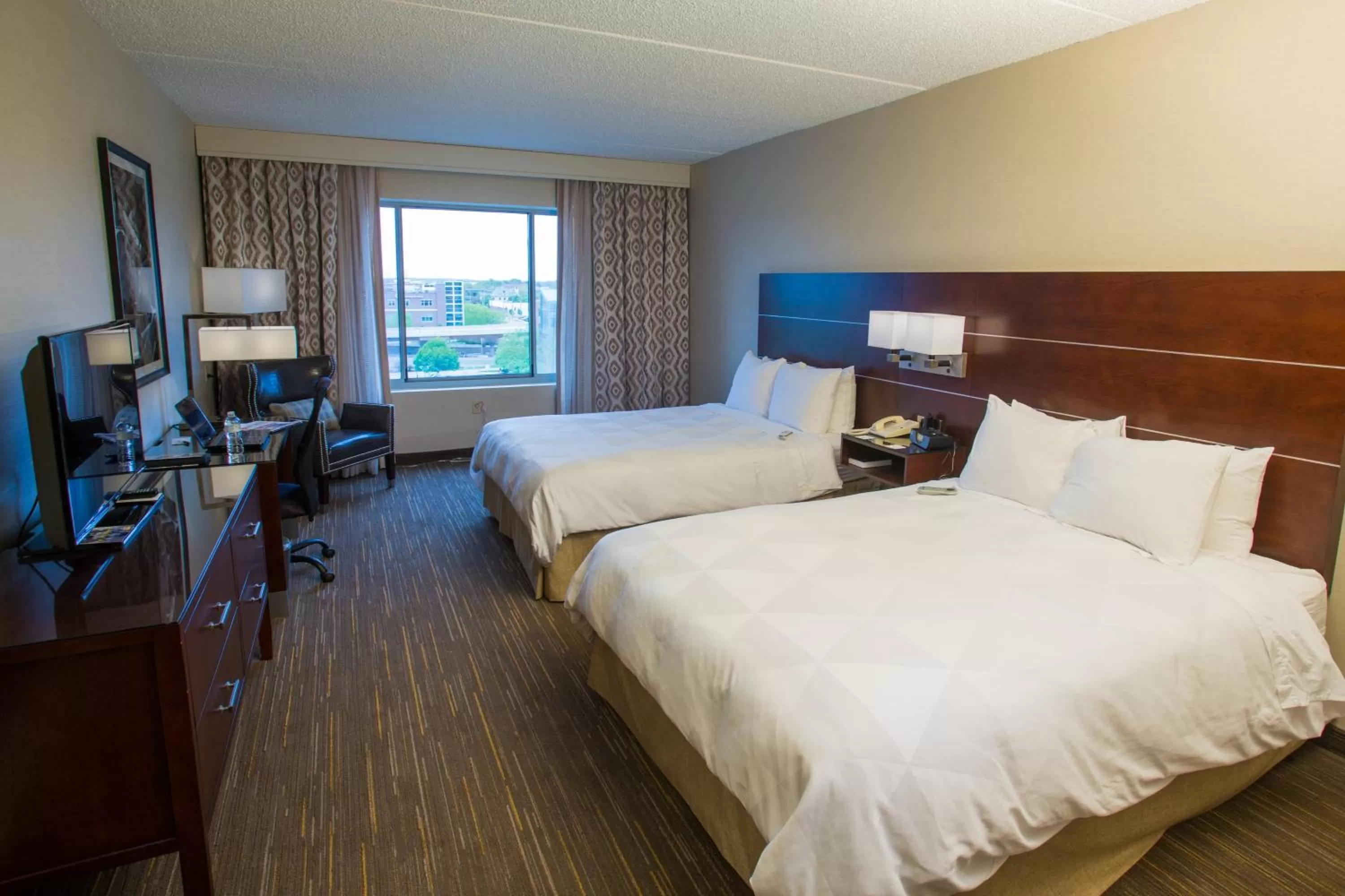Photo of the whole room, Bed in Wyndham Moline on John Deere Commons