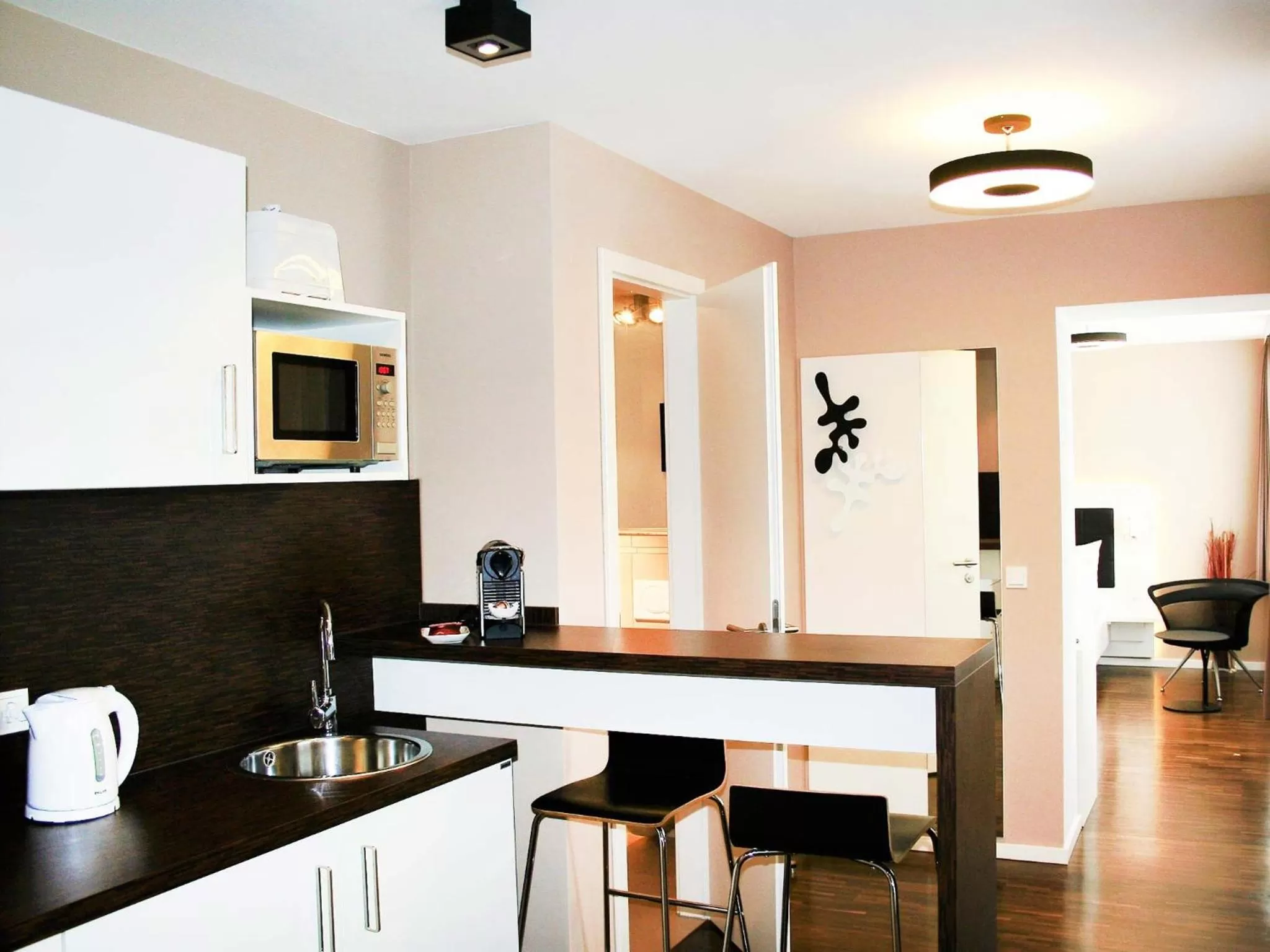 Kitchen or kitchenette in zeitwohnhaus SUITE-HOTEL & SERVICED APARTMENTS