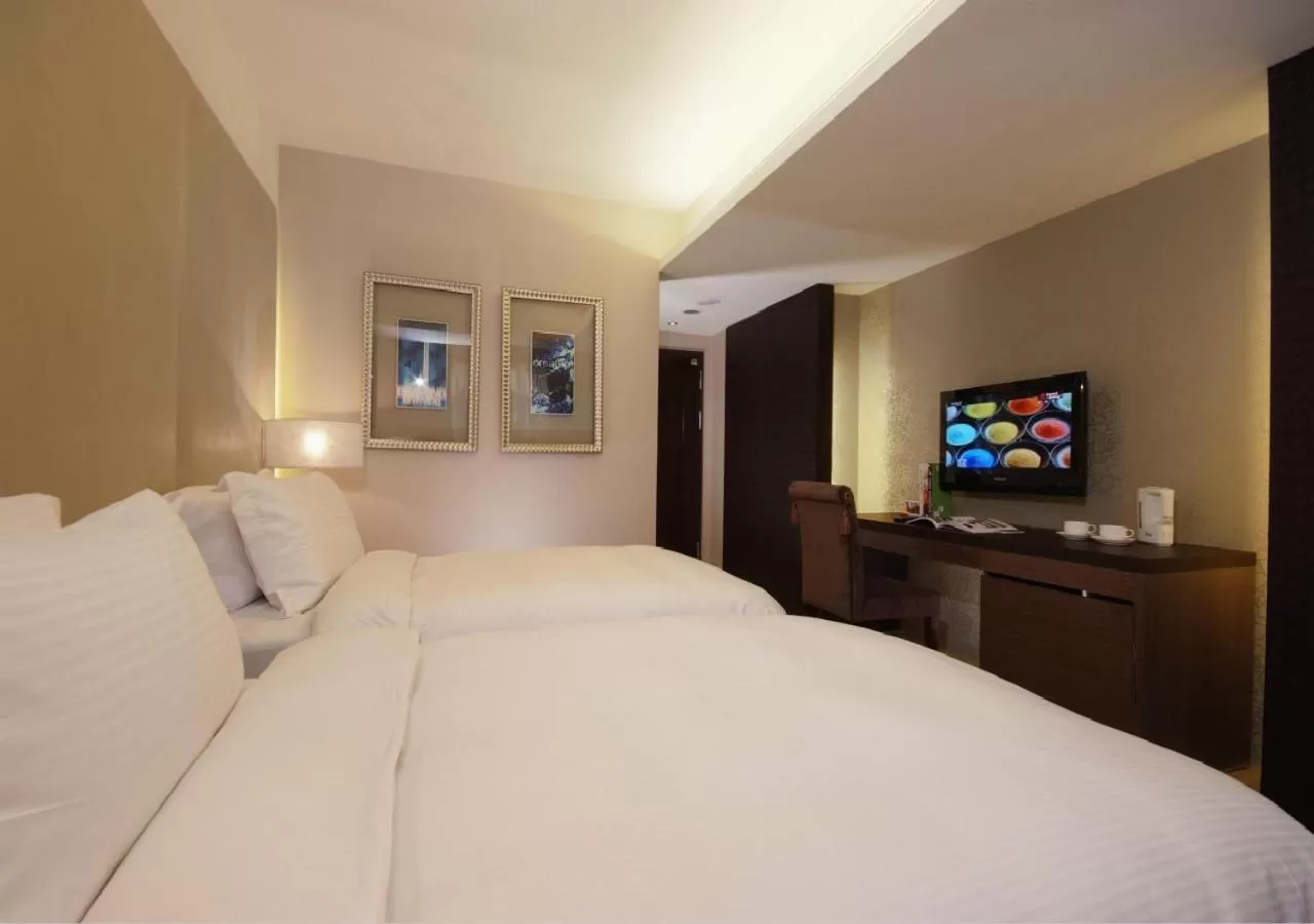 Bed in The Metro Hotel - Taipei Branch