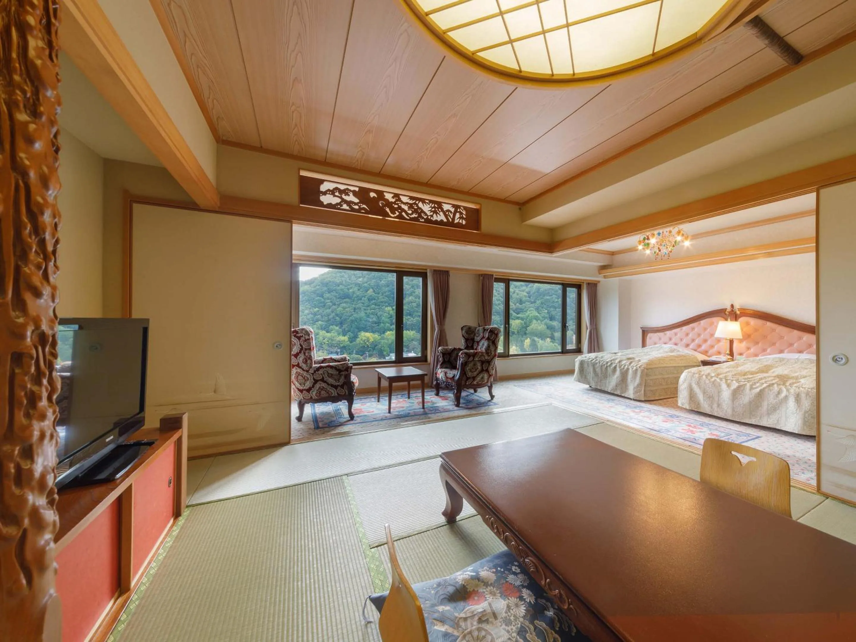 Living room, Bed in Jozankei View Hotel