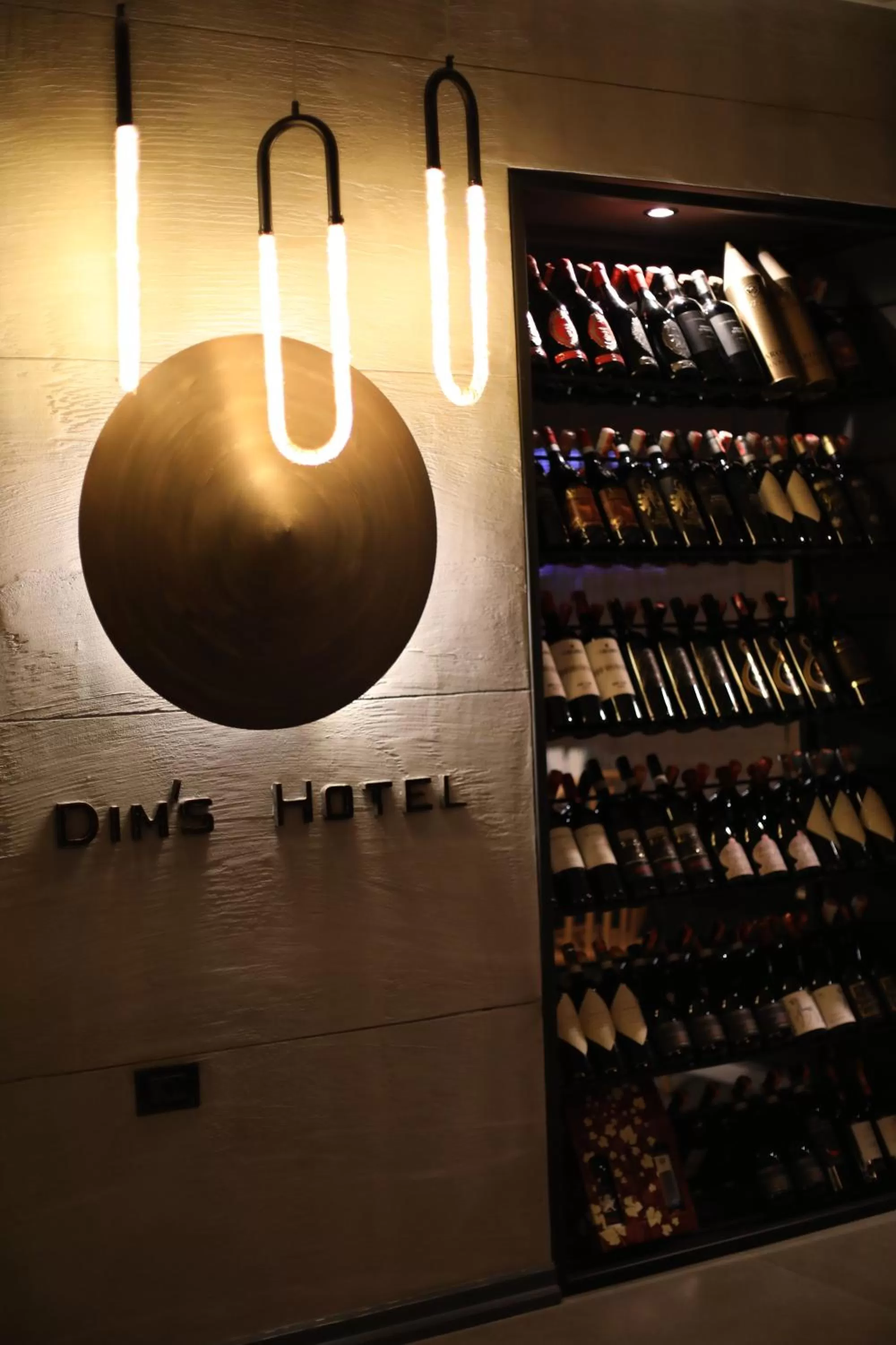 Property logo or sign in Dim's Hotel & Restaurant