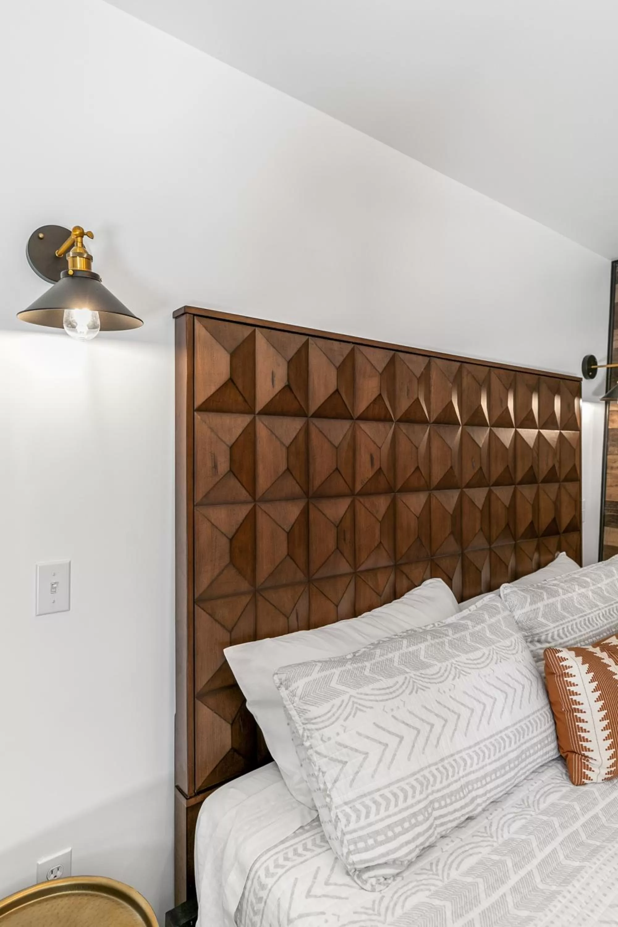 Bed in Candlewick Inn and Suites