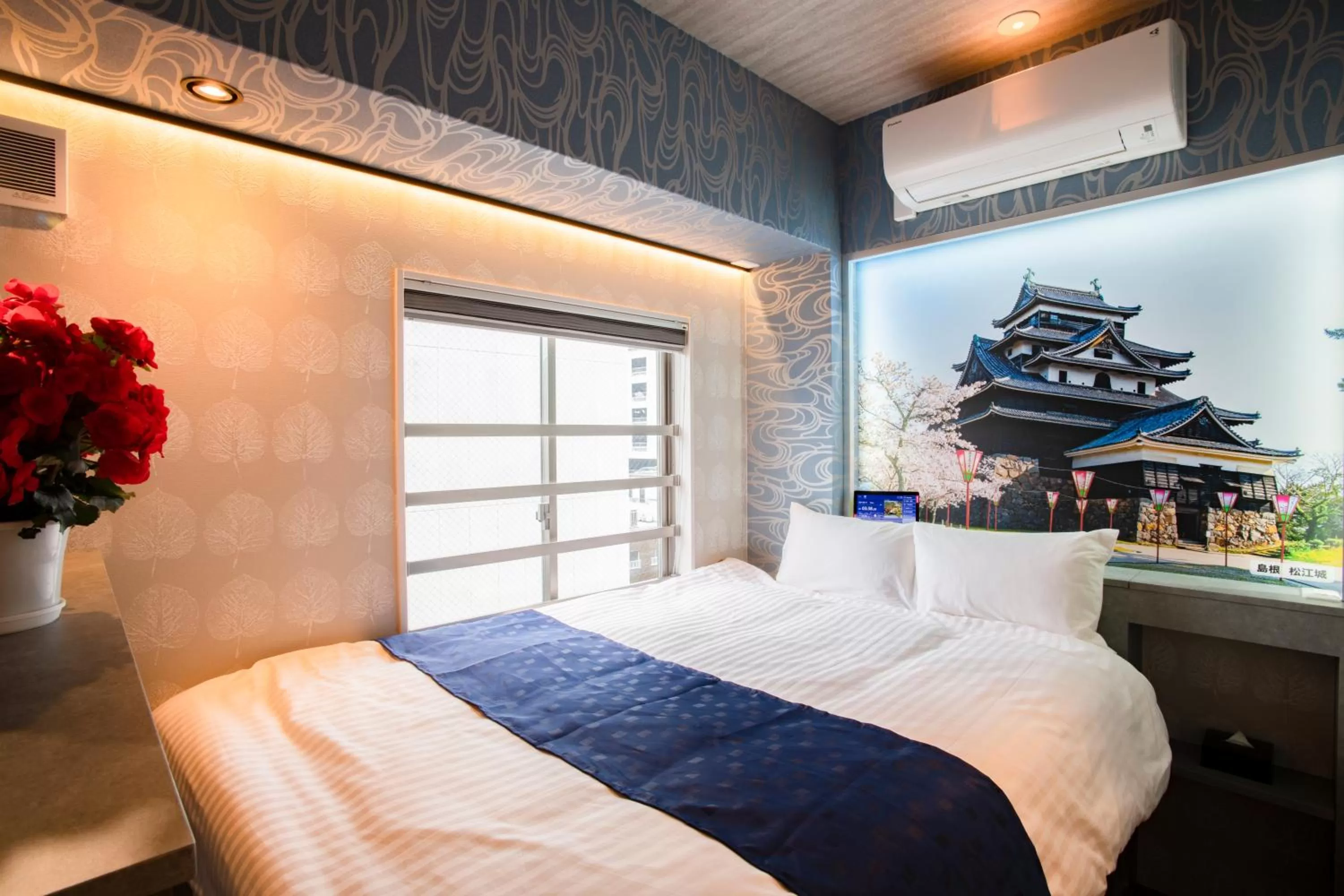 Bed in Pinpon Hotel Hiroshima