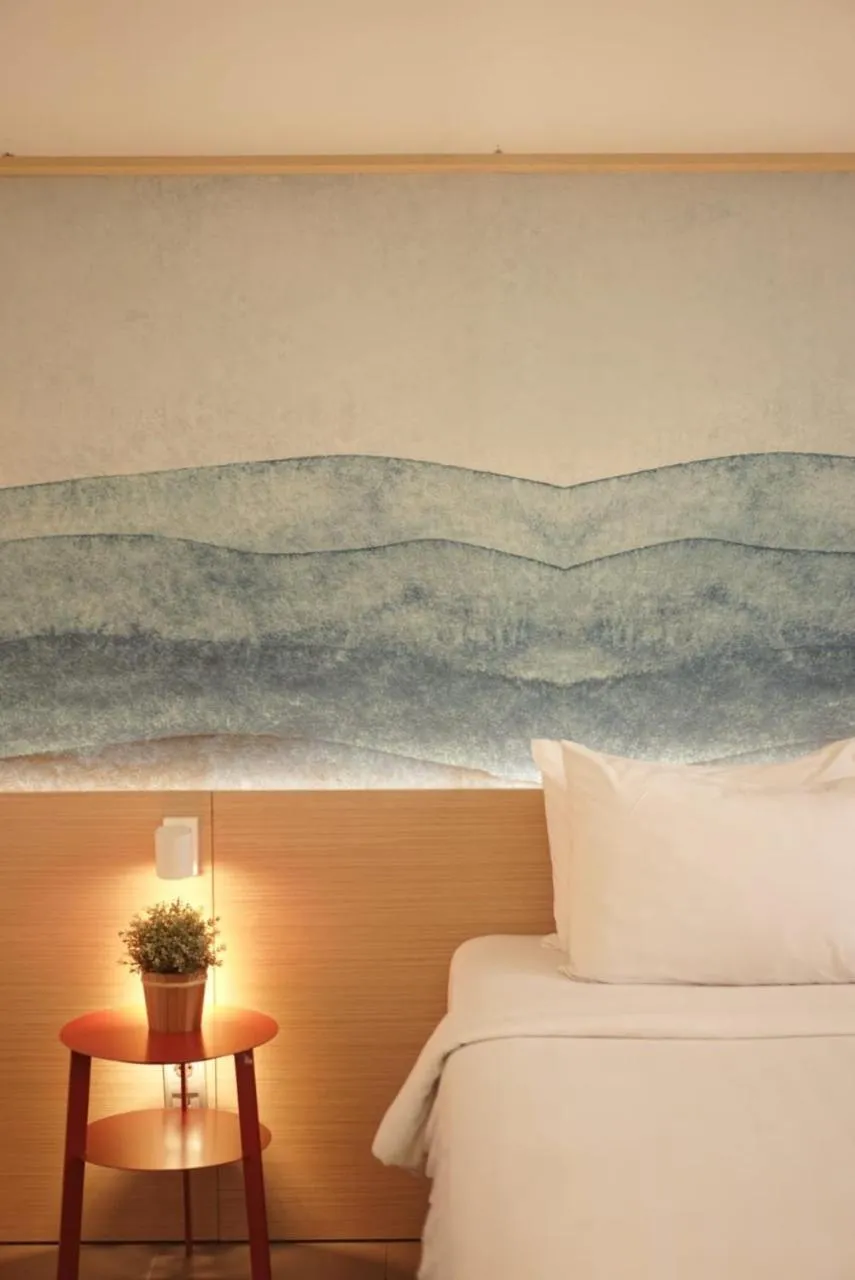 Bed in Malaka Hotel Bandung