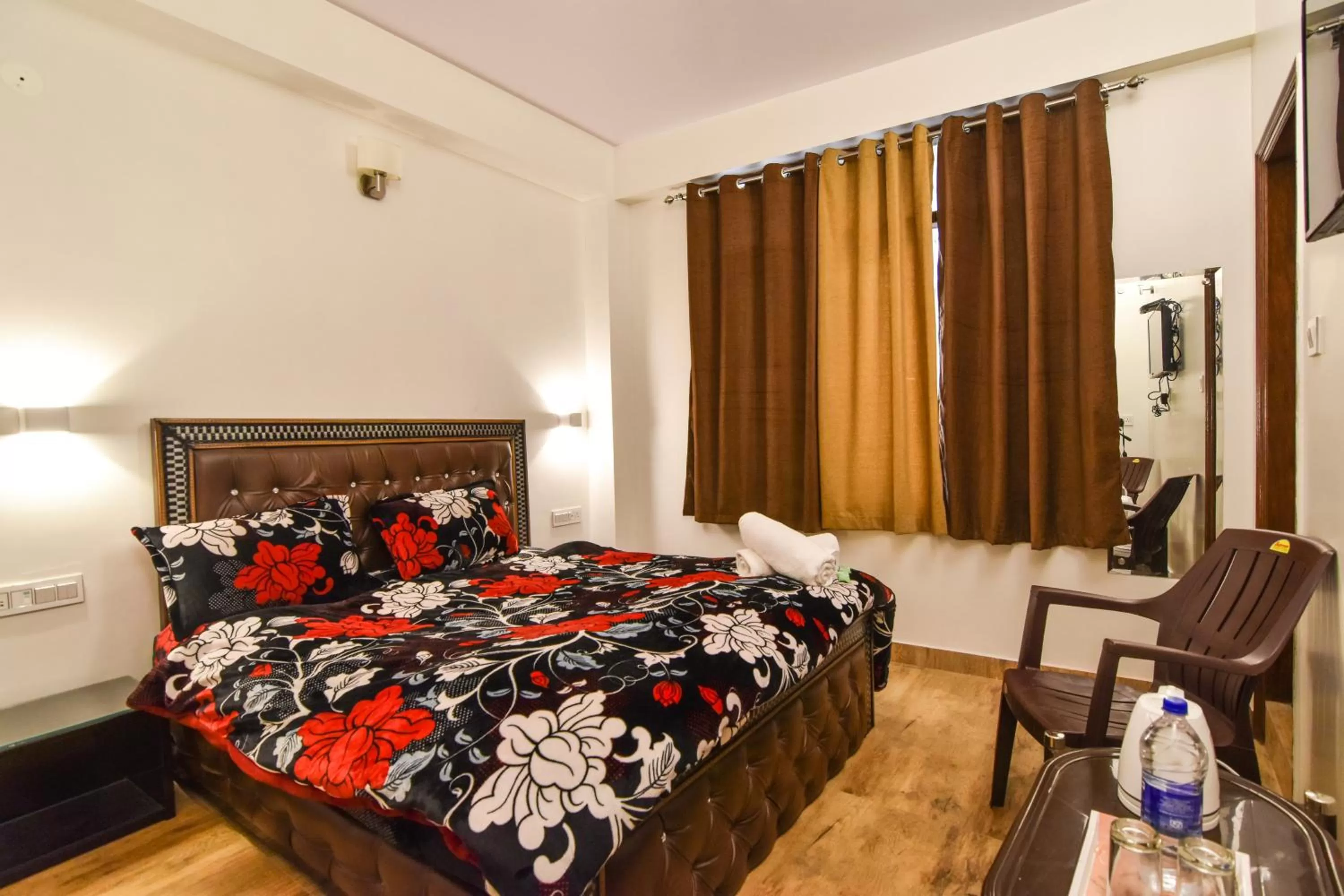 Bedroom, Bed in Dhanlaxmi Apartments