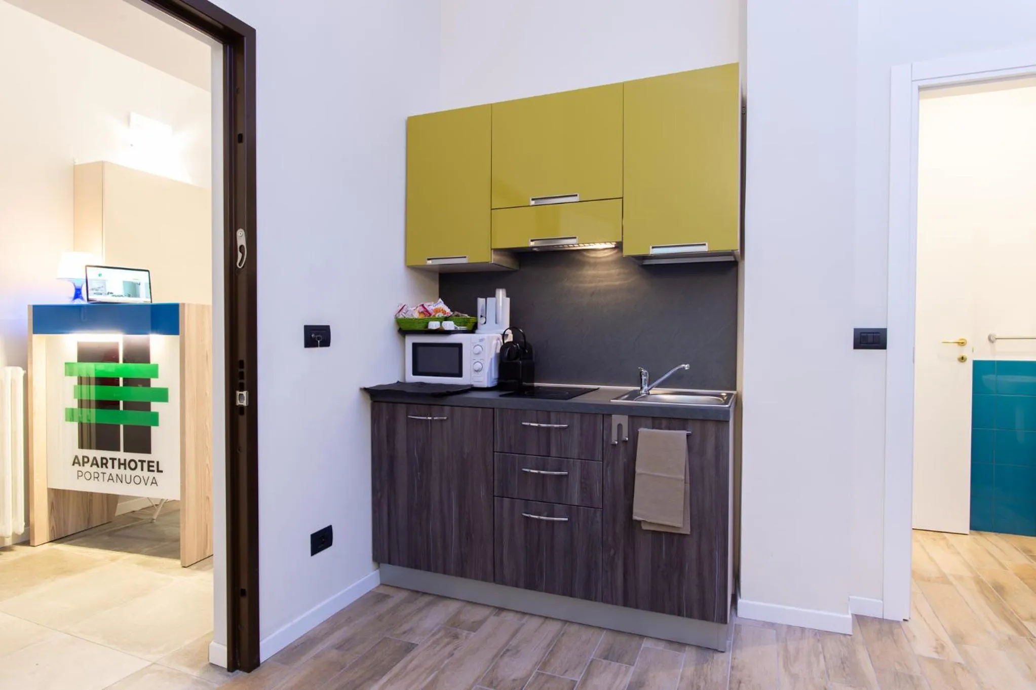 Kitchen or kitchenette in Aparthotel Porta Nuova