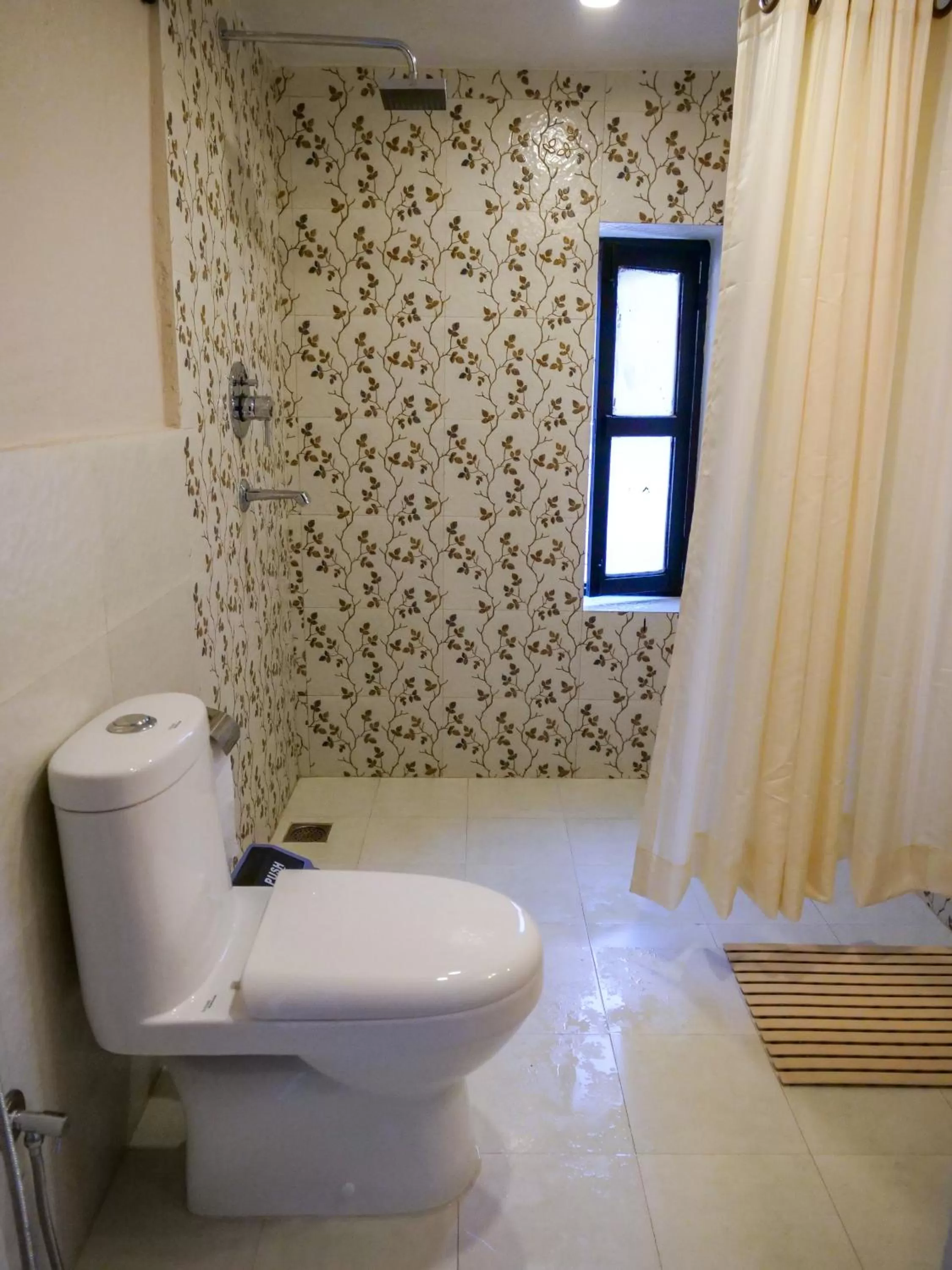 Bathroom in Omana Hotel