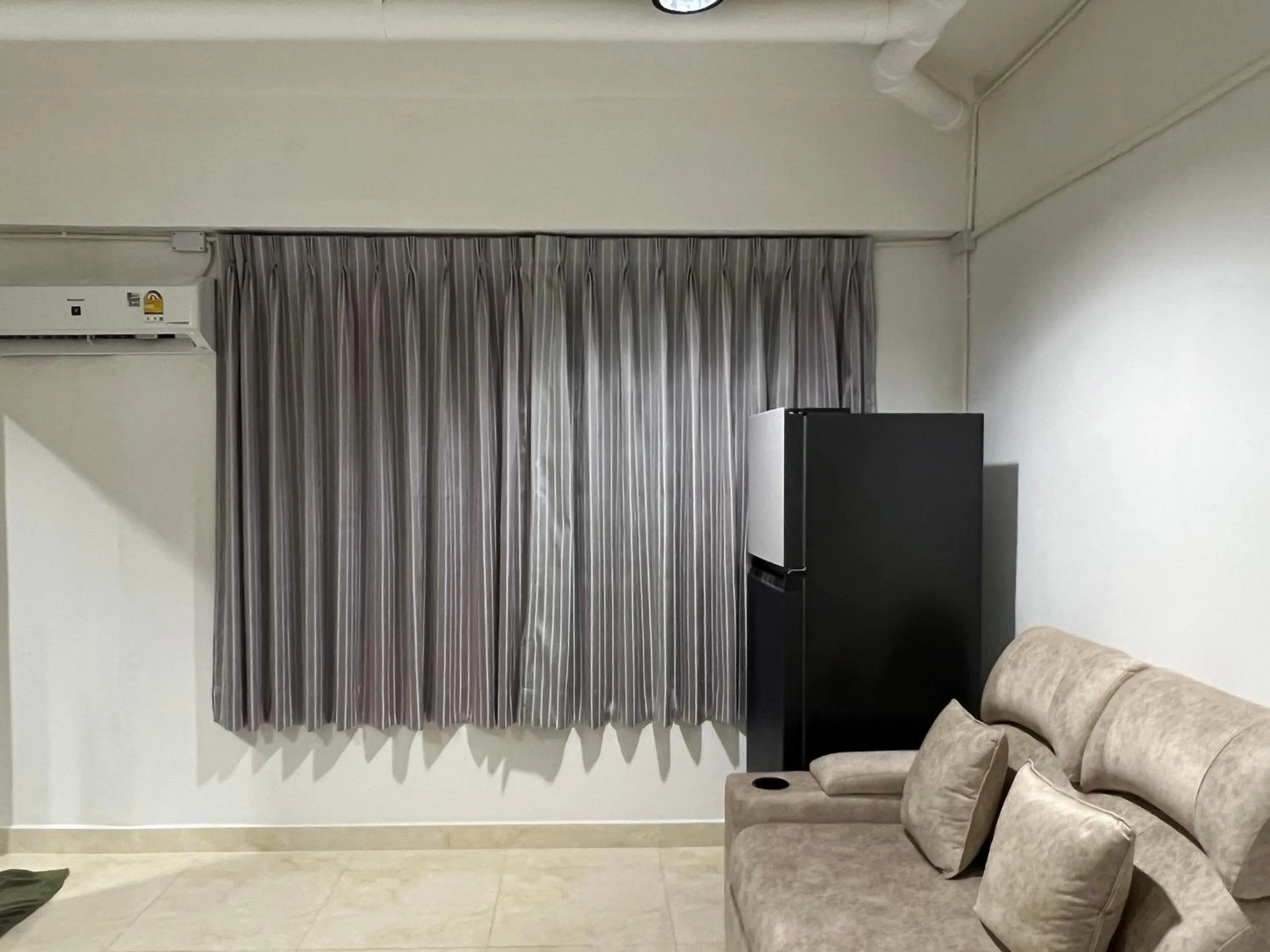 Seating area in Mall Suites Hotel