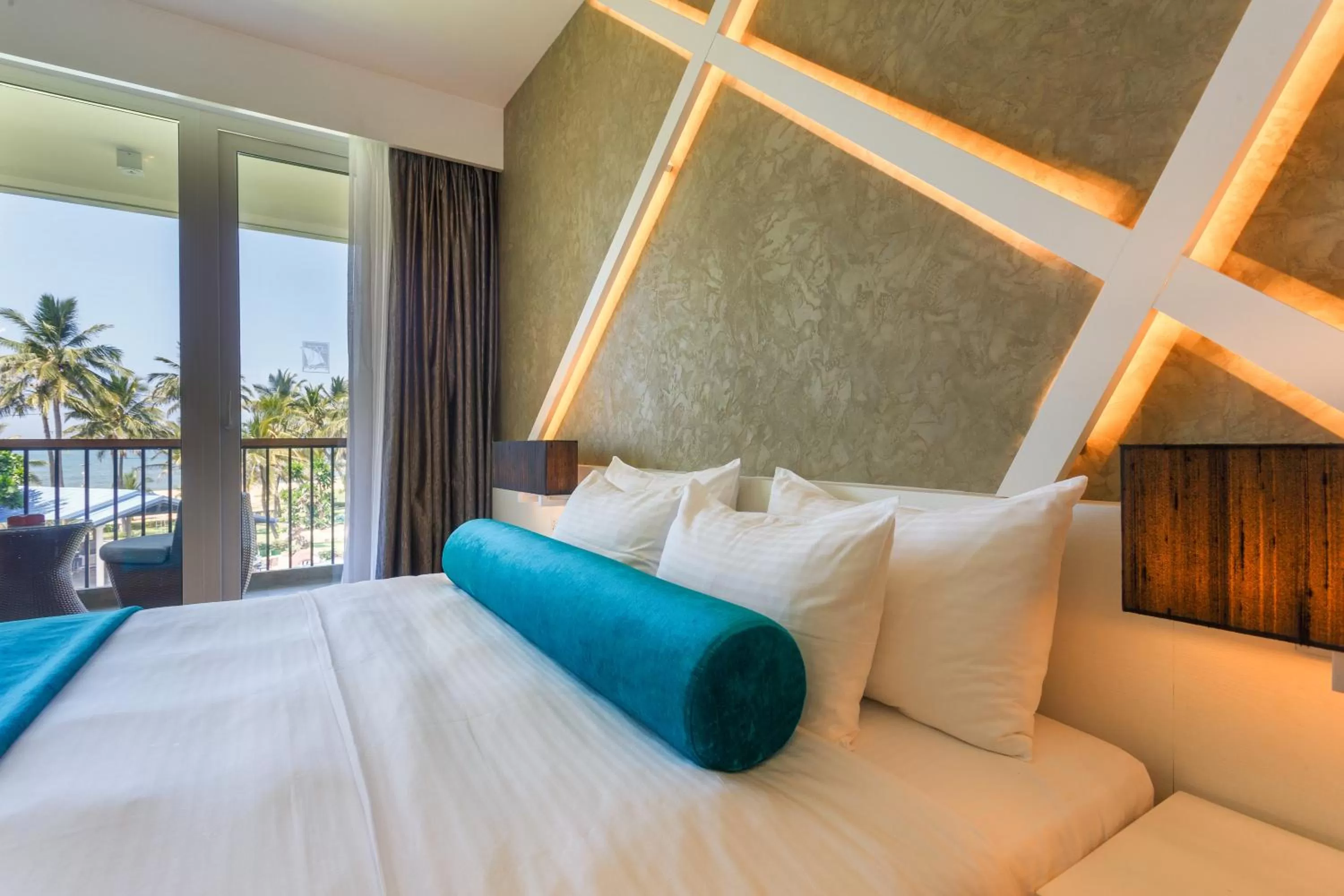 Bed in Camelot Beach Hotel