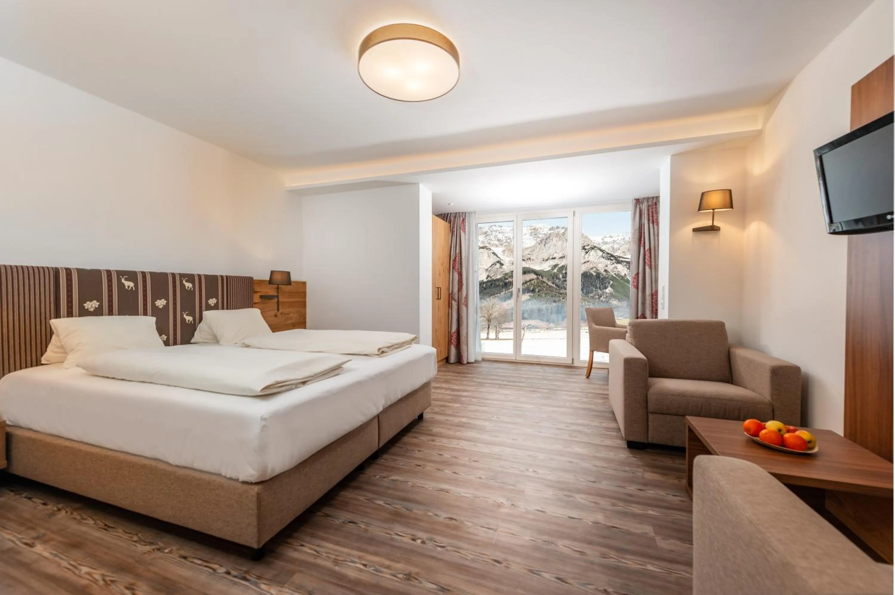 Photo of the whole room, Bed in Aktivhotel Pehab - Dachstein Rooftop-Spa