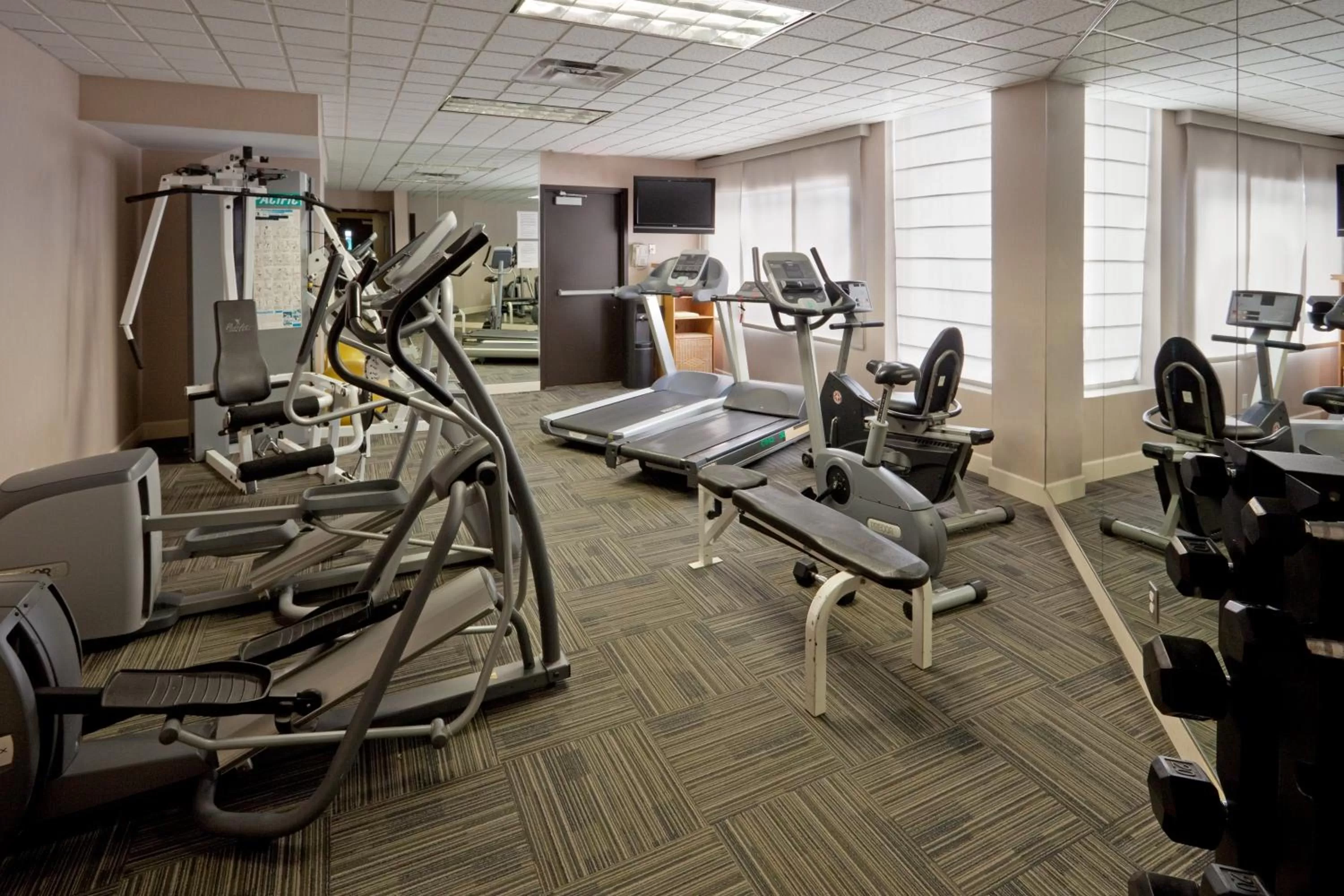 Fitness centre/facilities in Armon Plaza Montreal Airpt, Trademark Collection by Wyndham