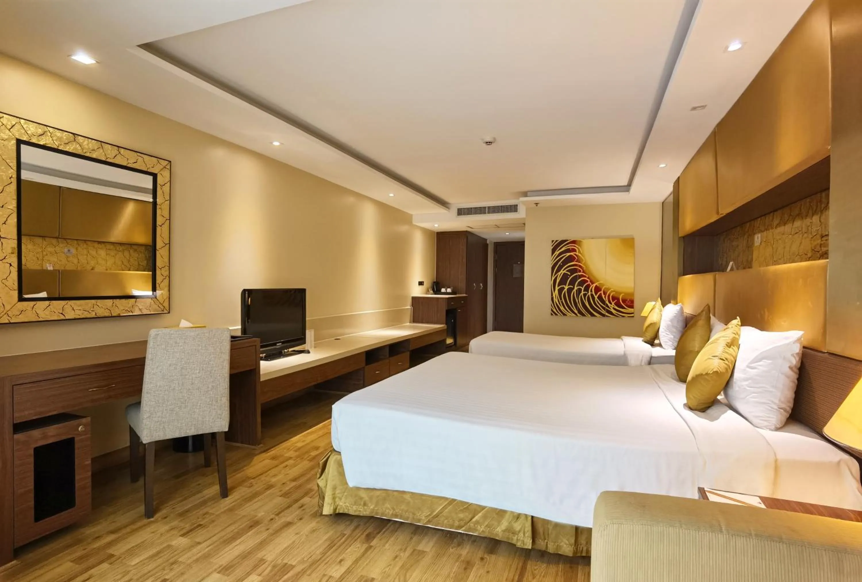 Bed in Nova Gold Hotel Pattaya