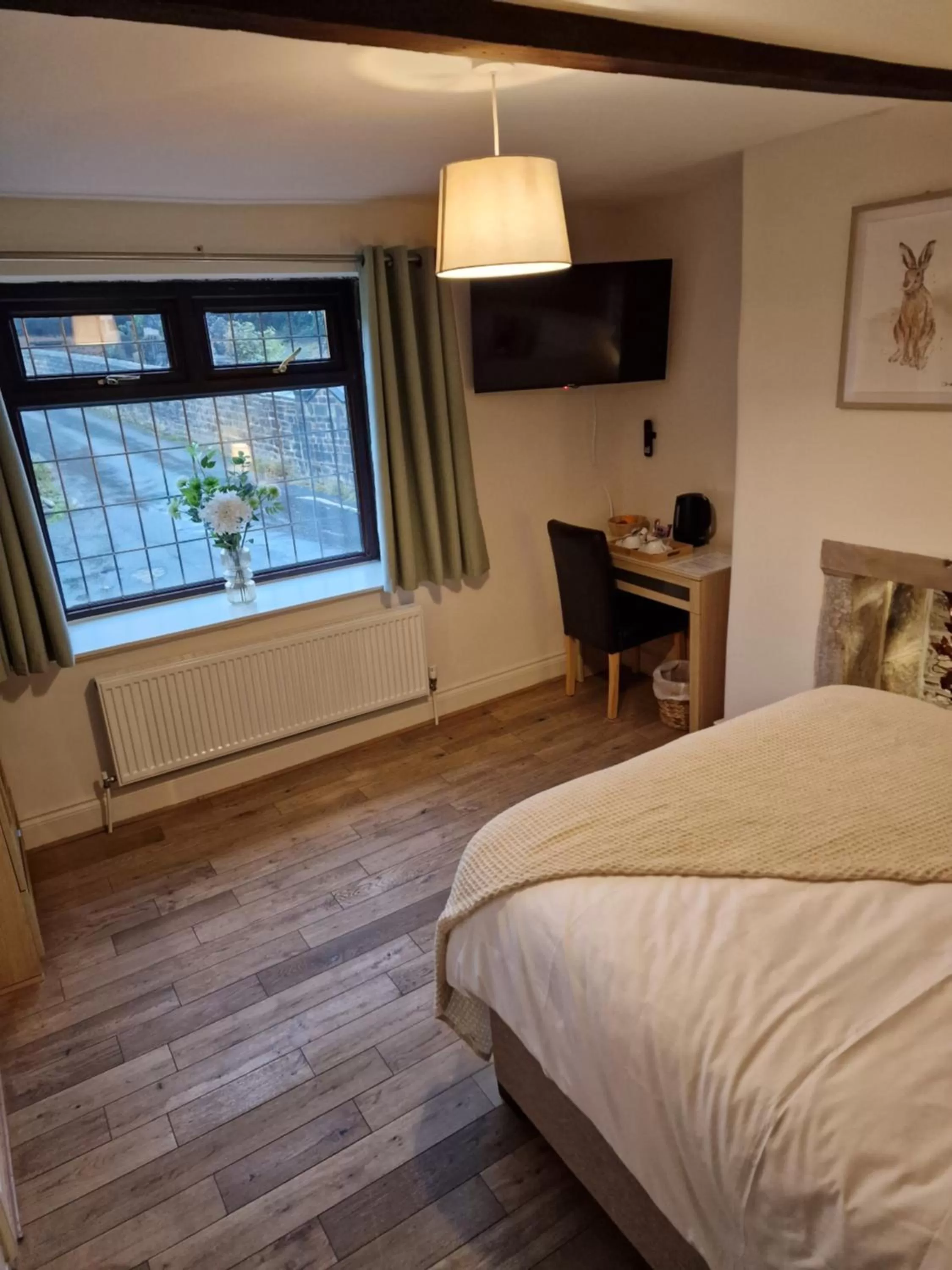 Bed in The New Rushcart Inn & Country Dining