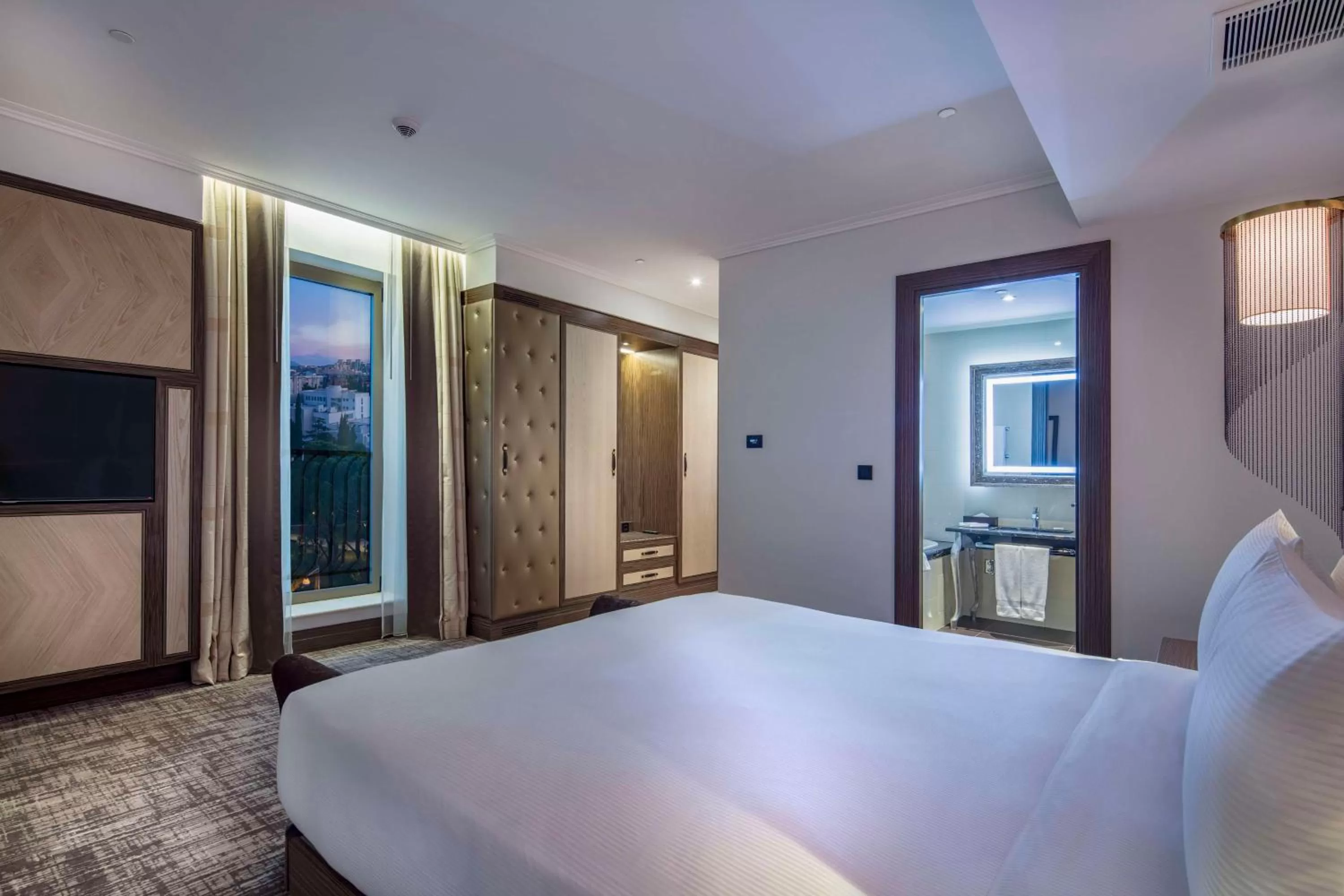 View (from property/room), Bed in Hilton Podgorica Crna Gora